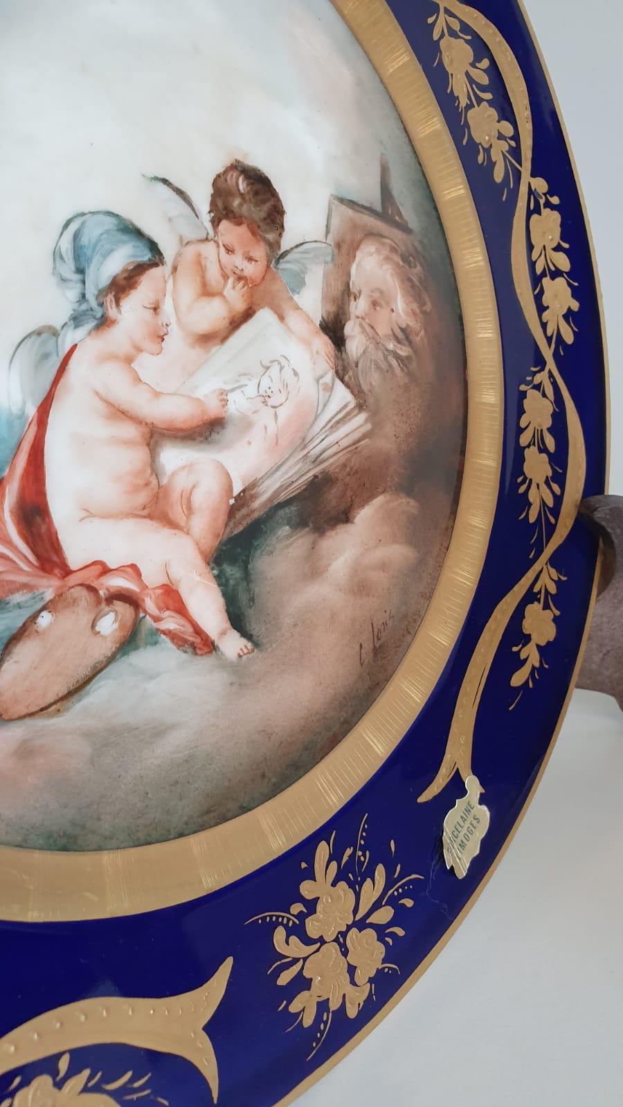 Pair of Blue and Gold Limoges Porcelain Plates Finely Hand Painted Cherubs For Sale 1
