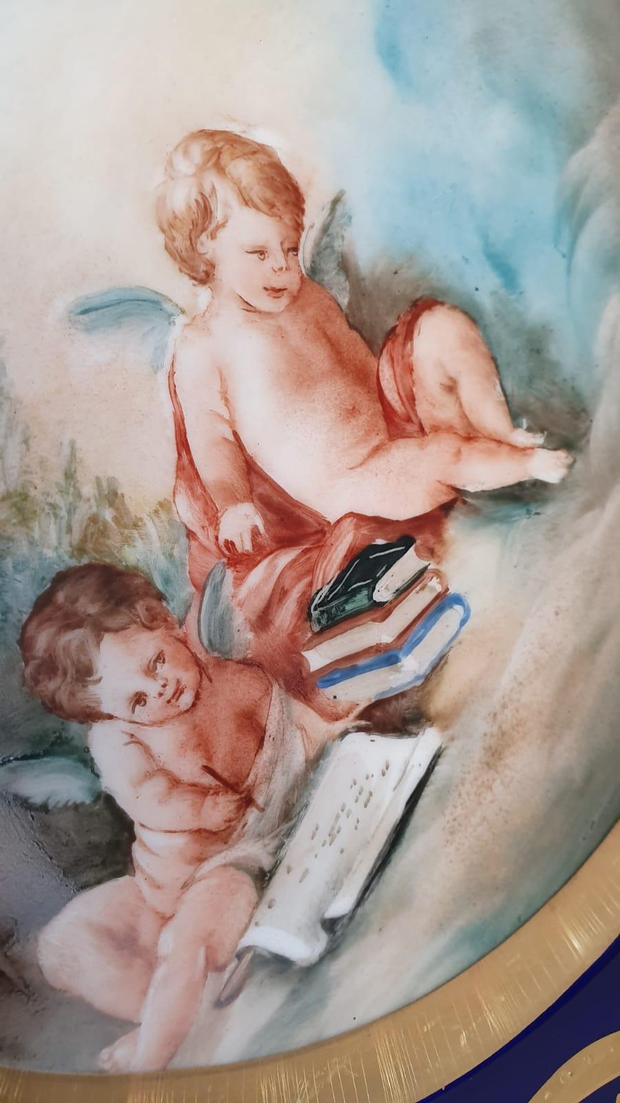 Pair of Blue and Gold Limoges Porcelain Plates Finely Hand Painted Cherubs For Sale 2