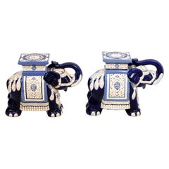 Pair of Blue and Ivory Painted Ceramic Garden Elephant Seats