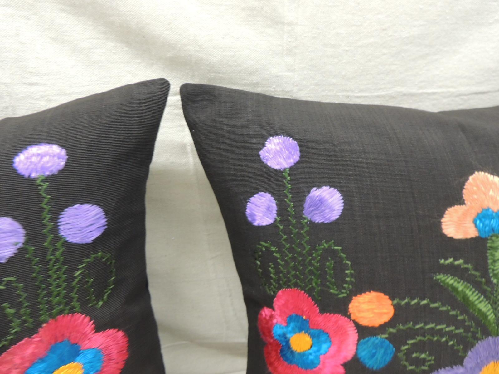 Pair of Blue and Pink Square Decorative Pillows.
Suzani style embroidery, silk threads on black cotton/linen blend.
Solid black backings. 
Decorative pillow handcrafted and designed in the USA. 
Closure by stitch (no zipper closure) with