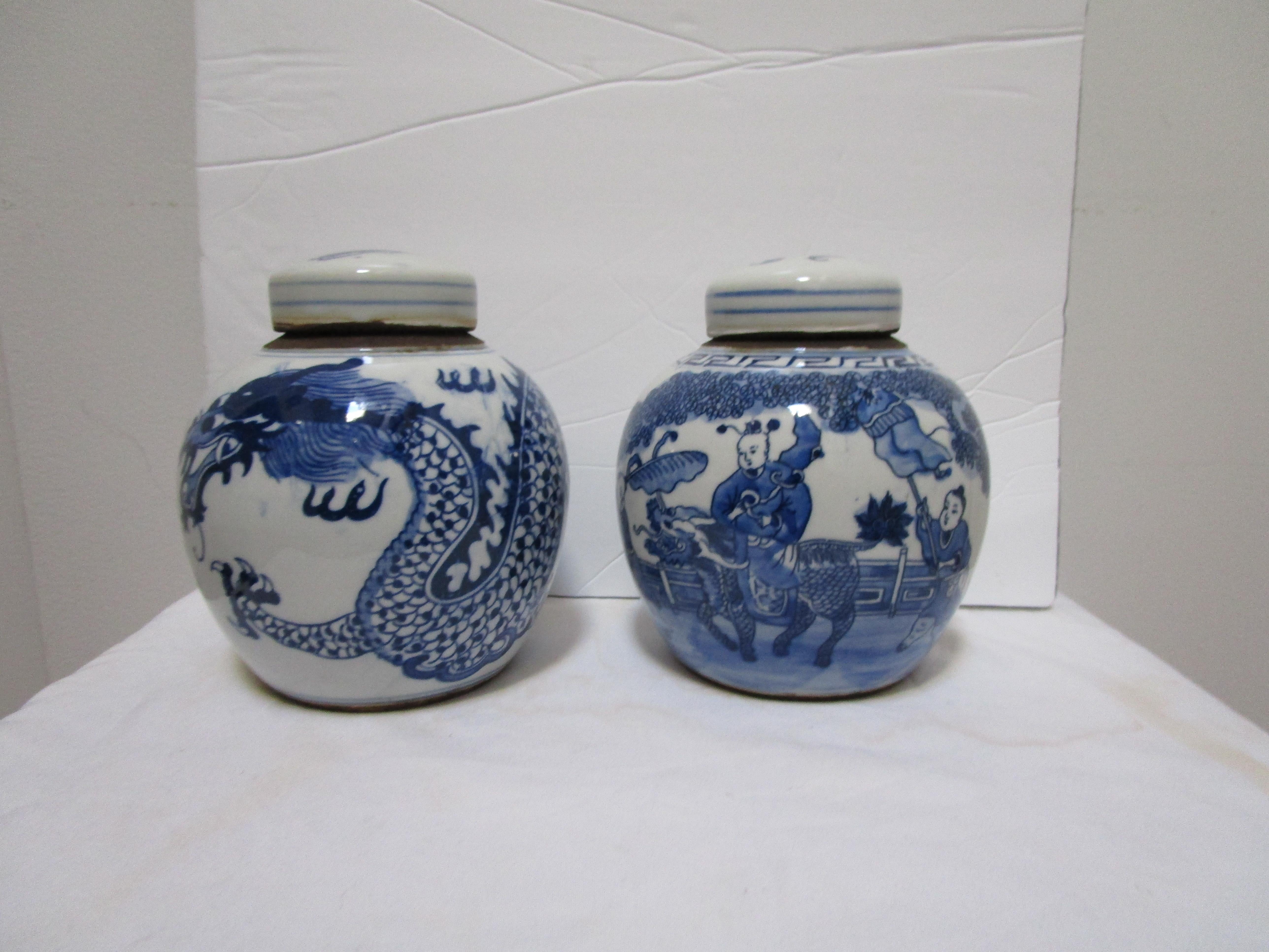 The set of blue and white ceramic jars with original lids presents beautifully in the remainder of the year of the dragon with one design dominated by a dragon as it snakes around one of the jars.
The second jar in this set features a young boy or