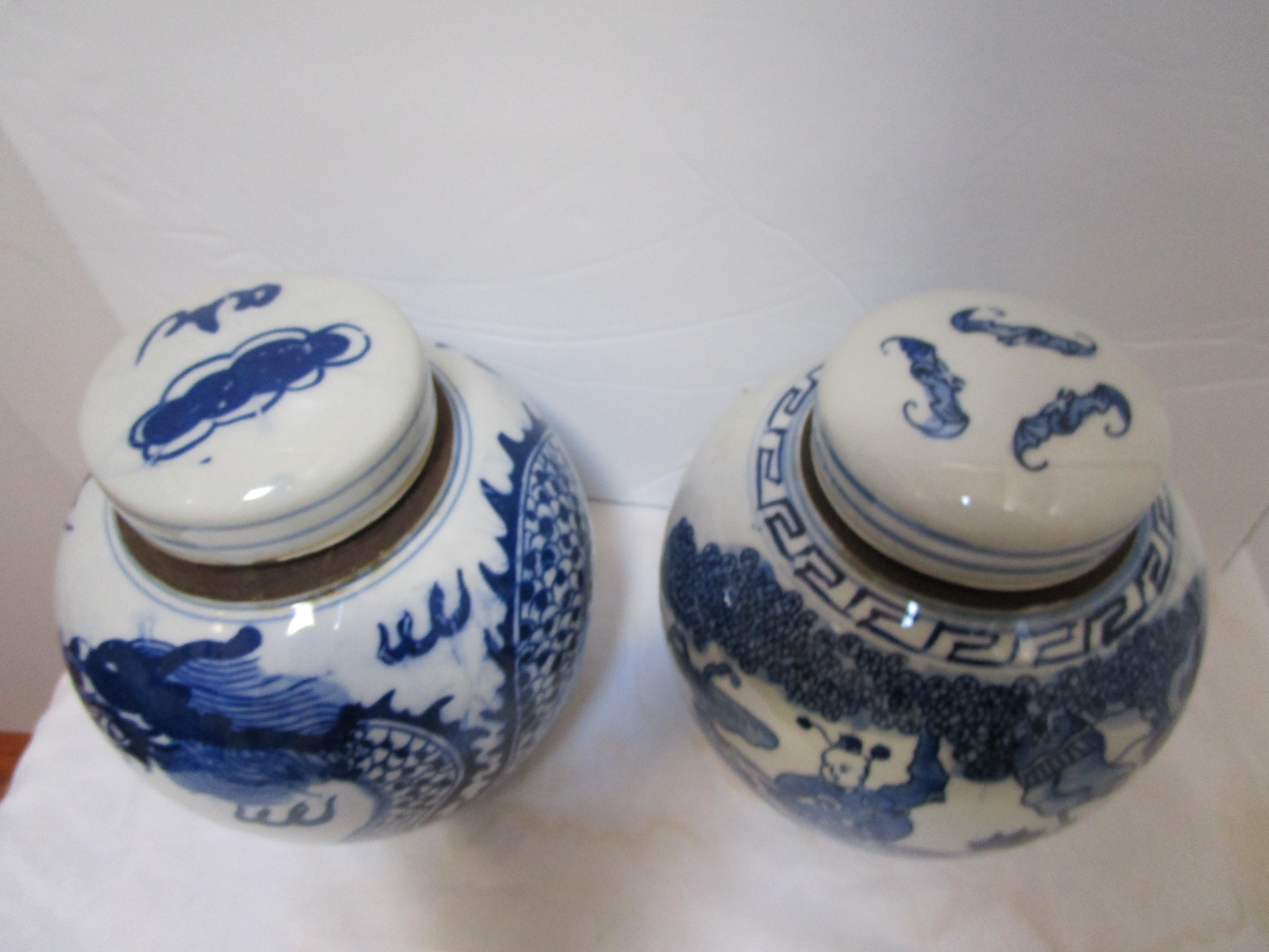Chinese Pair of Blue and White Ceramic Jars with Dragon and Figural Ancestral Motif For Sale