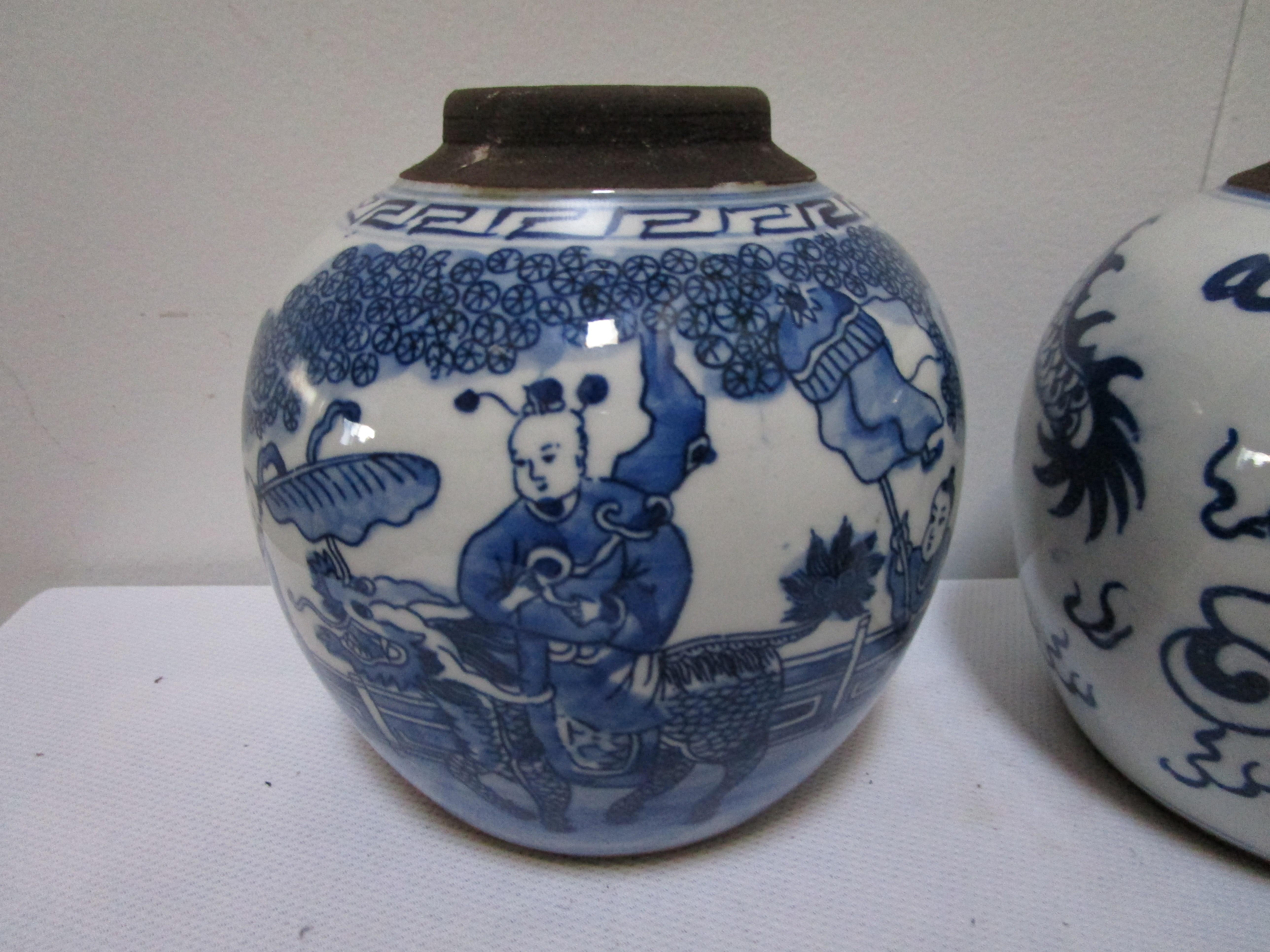 20th Century Pair of Blue and White Ceramic Jars with Dragon and Figural Ancestral Motif For Sale