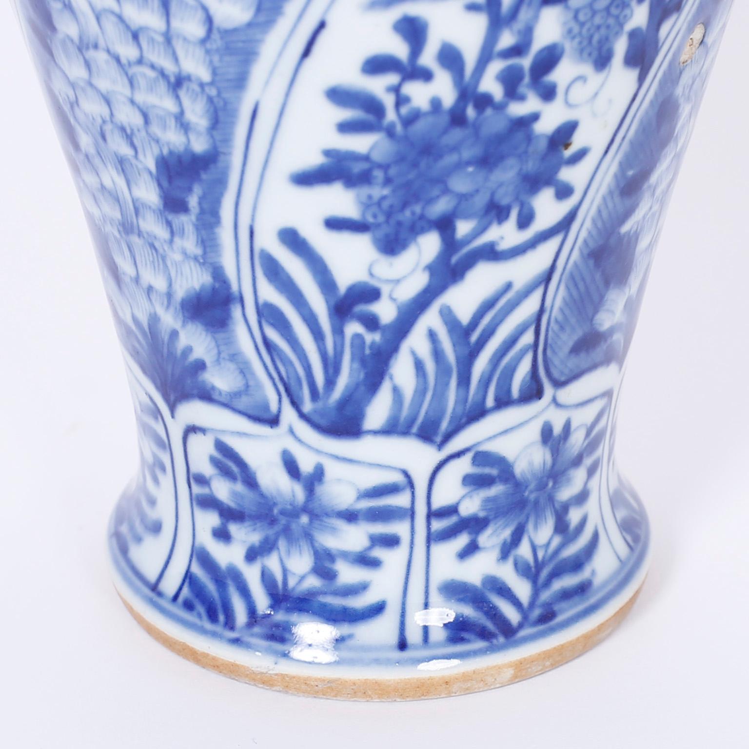 Pair of Blue and White Chinese Porcelain Lidded Urns In Excellent Condition In Palm Beach, FL