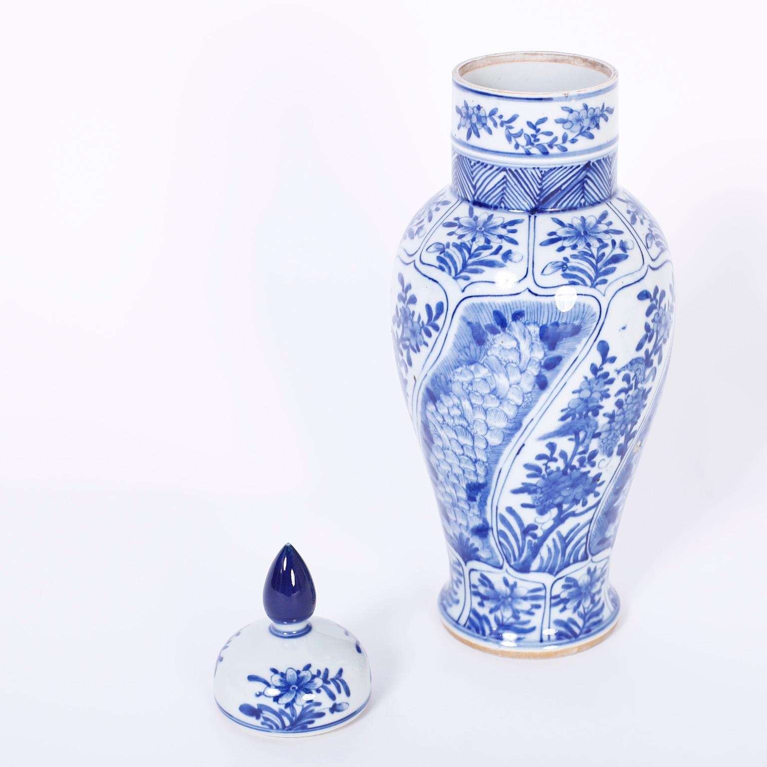 Contemporary Pair of Blue and White Chinese Porcelain Lidded Urns