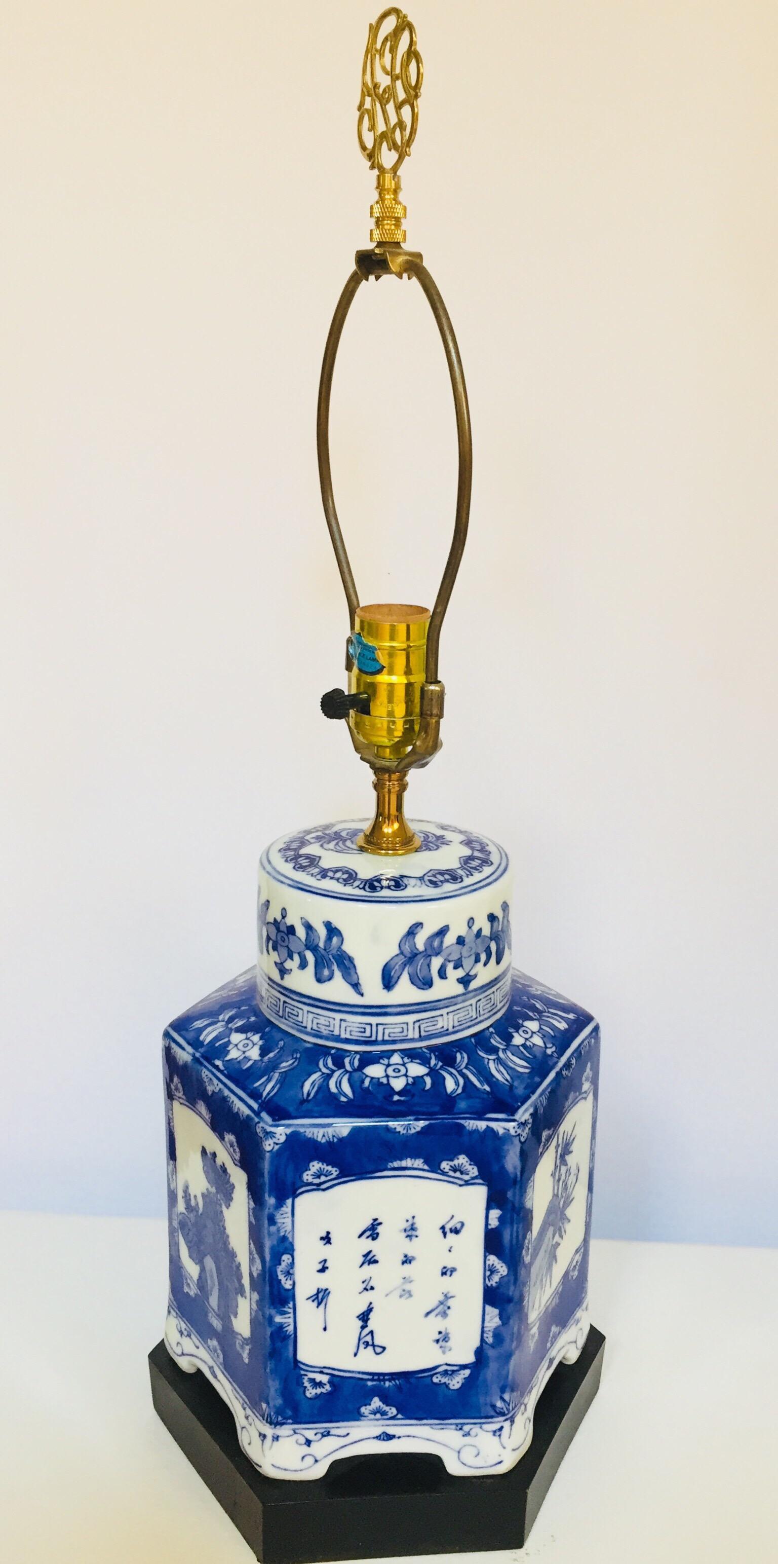 Pair of midcentury Chinese porcelain table lamps on a wooden base.
Pair of blue and white Chinese tea canisters converted into table lamps.
The two canister are almost a pair, color and design is a little bit different and final is