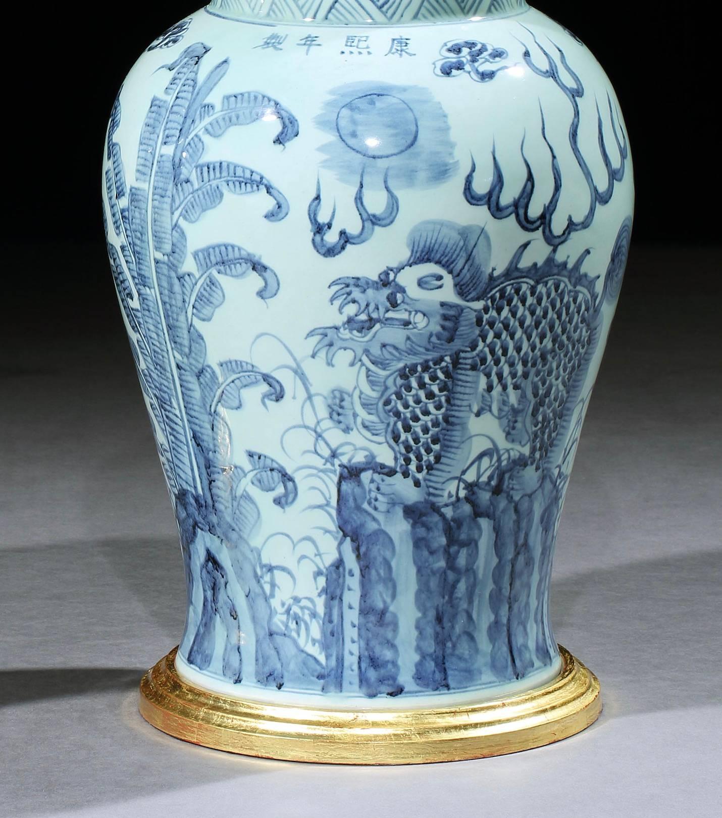 Chinoiserie Pair of Blue and White Chinese Vases with Foo Dogs