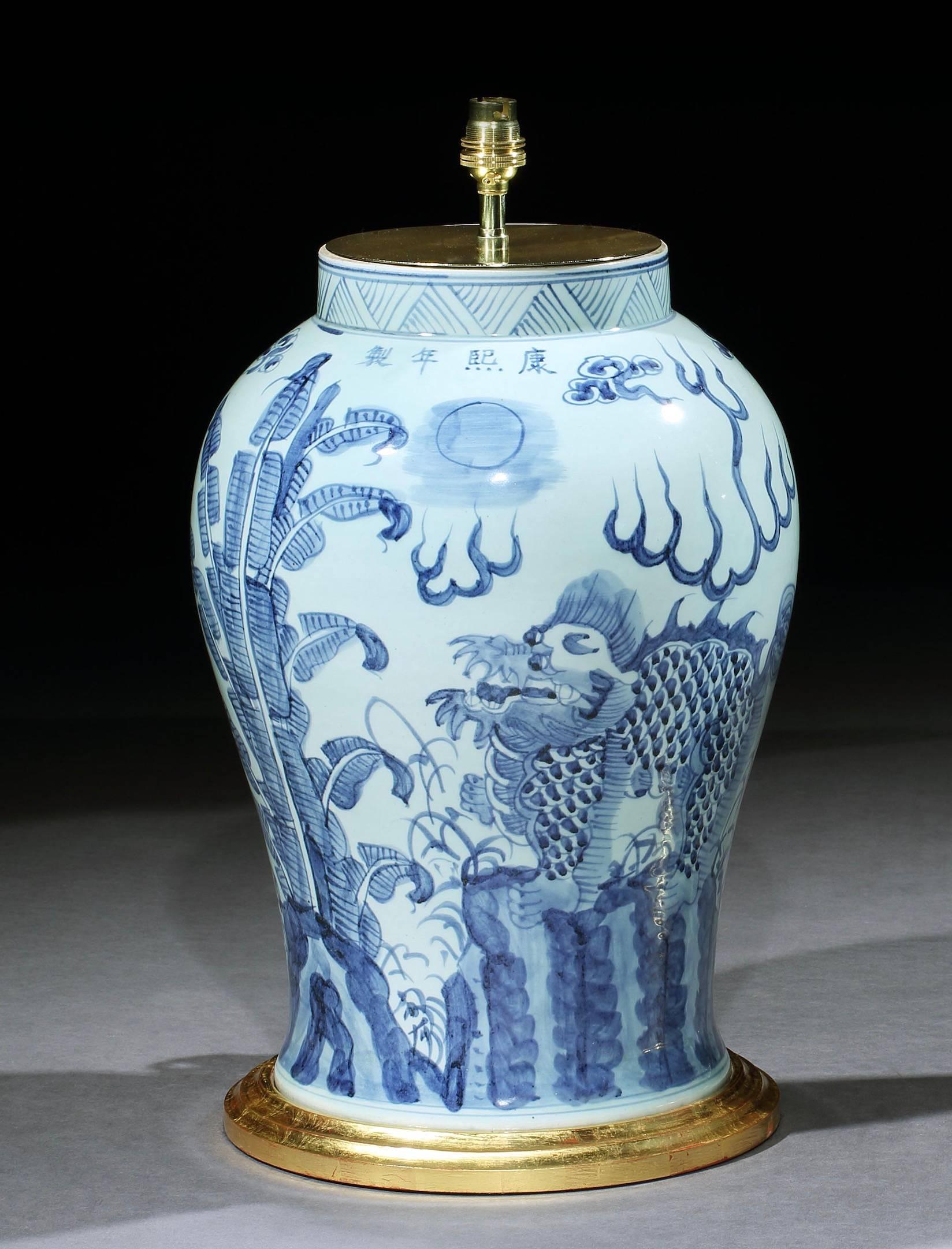 Glazed Pair of Blue and White Chinese Vases with Foo Dogs