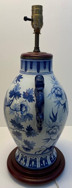 Pair of Blue and White Chinoiserie Porcelain Urn Table Lamps with Peacock Motifs