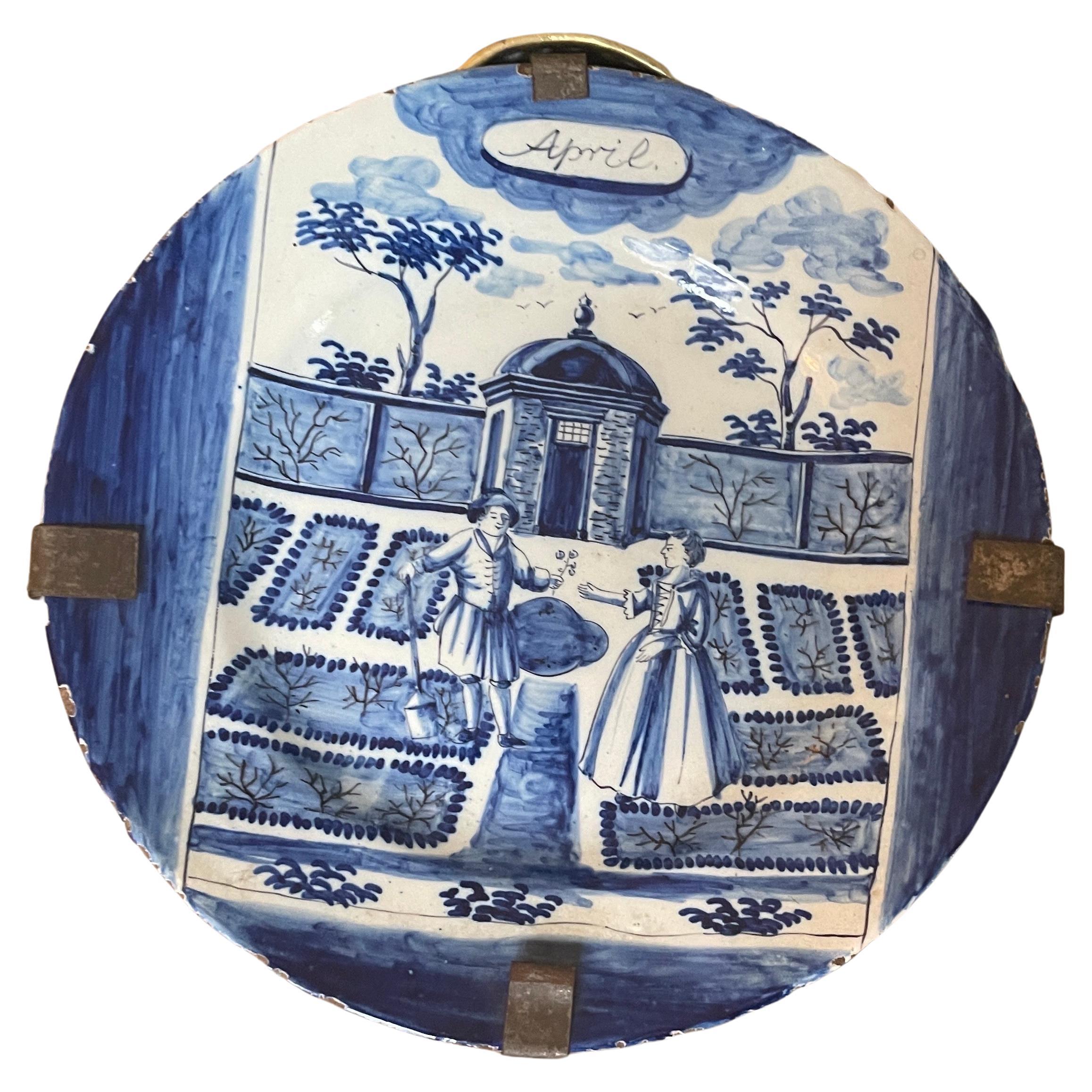Pair of Delft calendar plates in blue and white garden scenarie. 

March and April plates.

These two plates were part of a 12 plate series of calendar plates.
