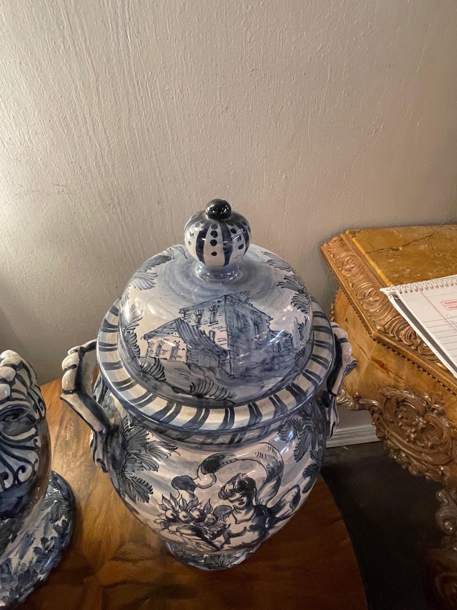 Glass Pair of Blue and White Faience Glazed Lidded Urns For Sale