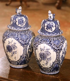 Pair of Blue and White Faience Royal Sphinx Delft Ginger Jars with Foo Dog Lids