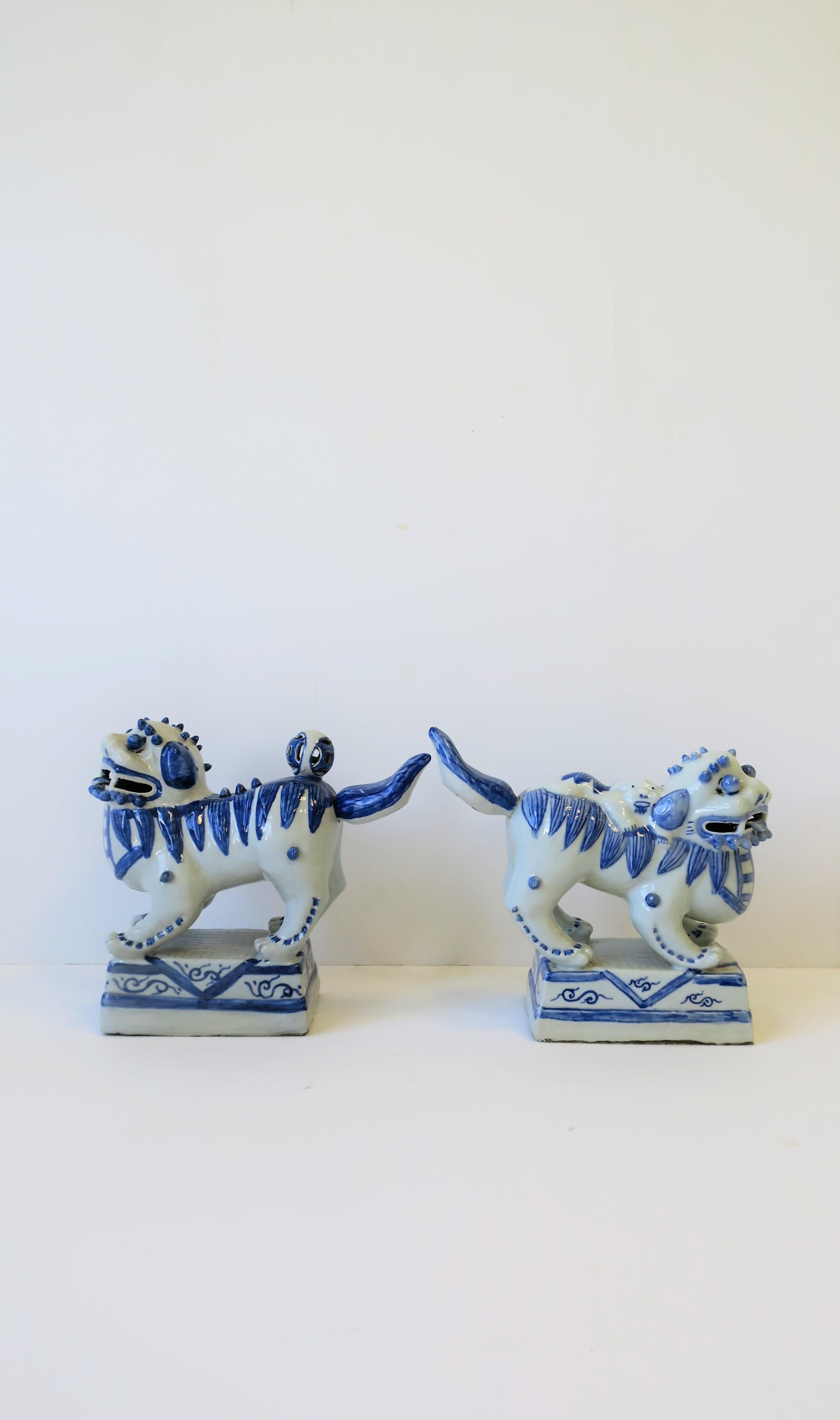 Pair of Blue and White Foo Dog or Lion Sculptures or Bookends 1