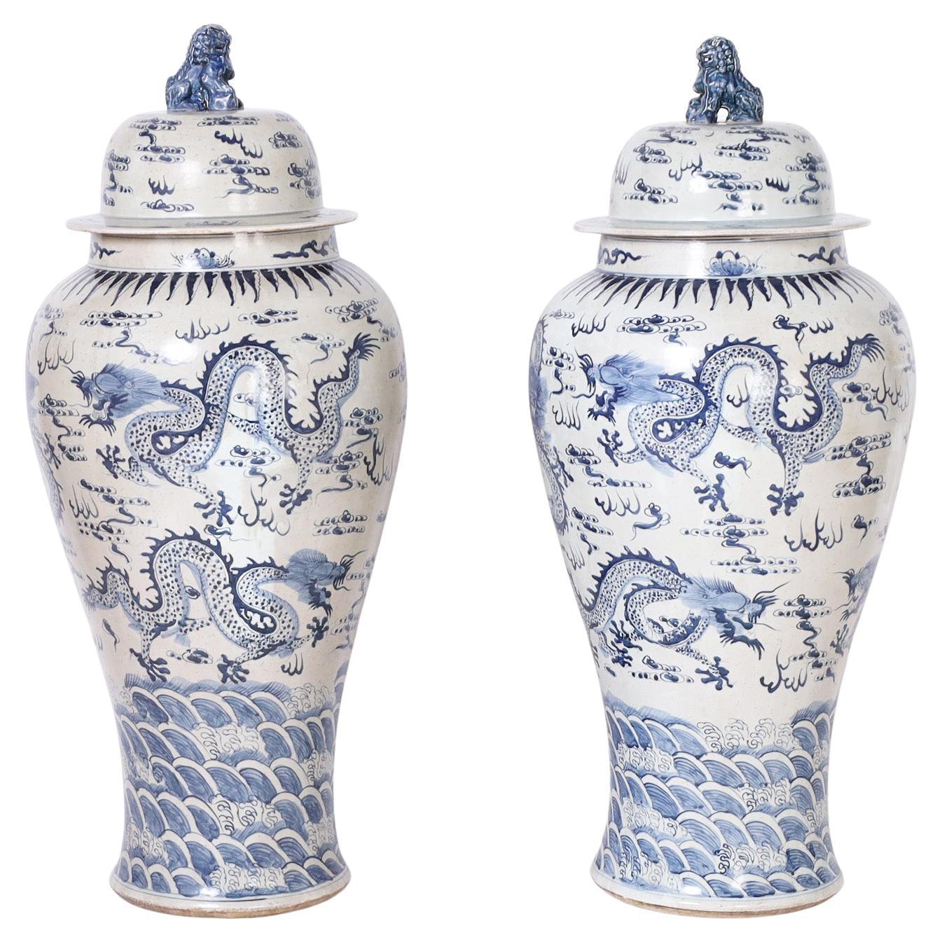Pair of Blue and White Lidded Palace Urns with Dragons