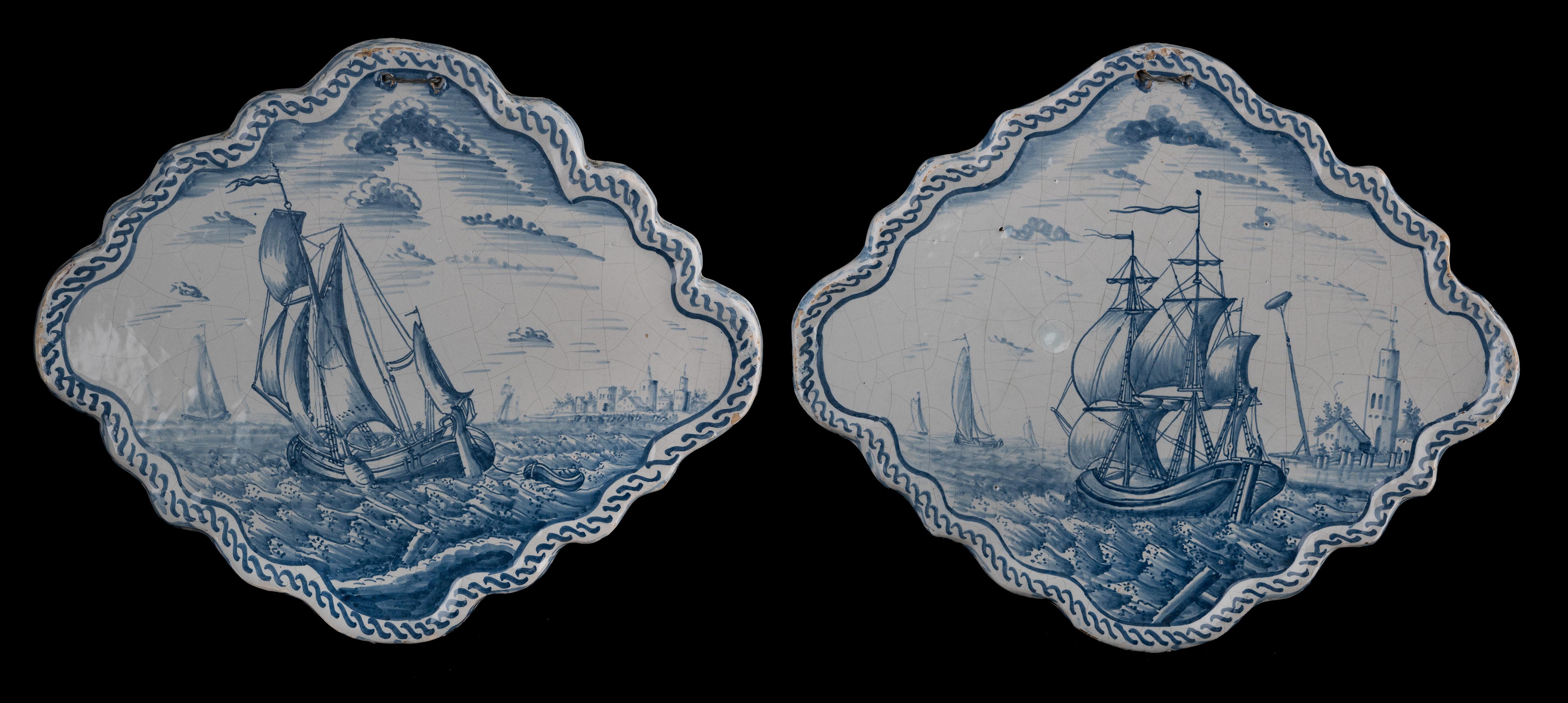 Pair of blue and white plaques with ships off the coast. Makkum, 1784-1800
Kingma pottery painter: Adam Sijbel

The diamond-shaped plaques have a raised, scalloped rim and are each painted with a coastal landscape with ships. In the foreground,