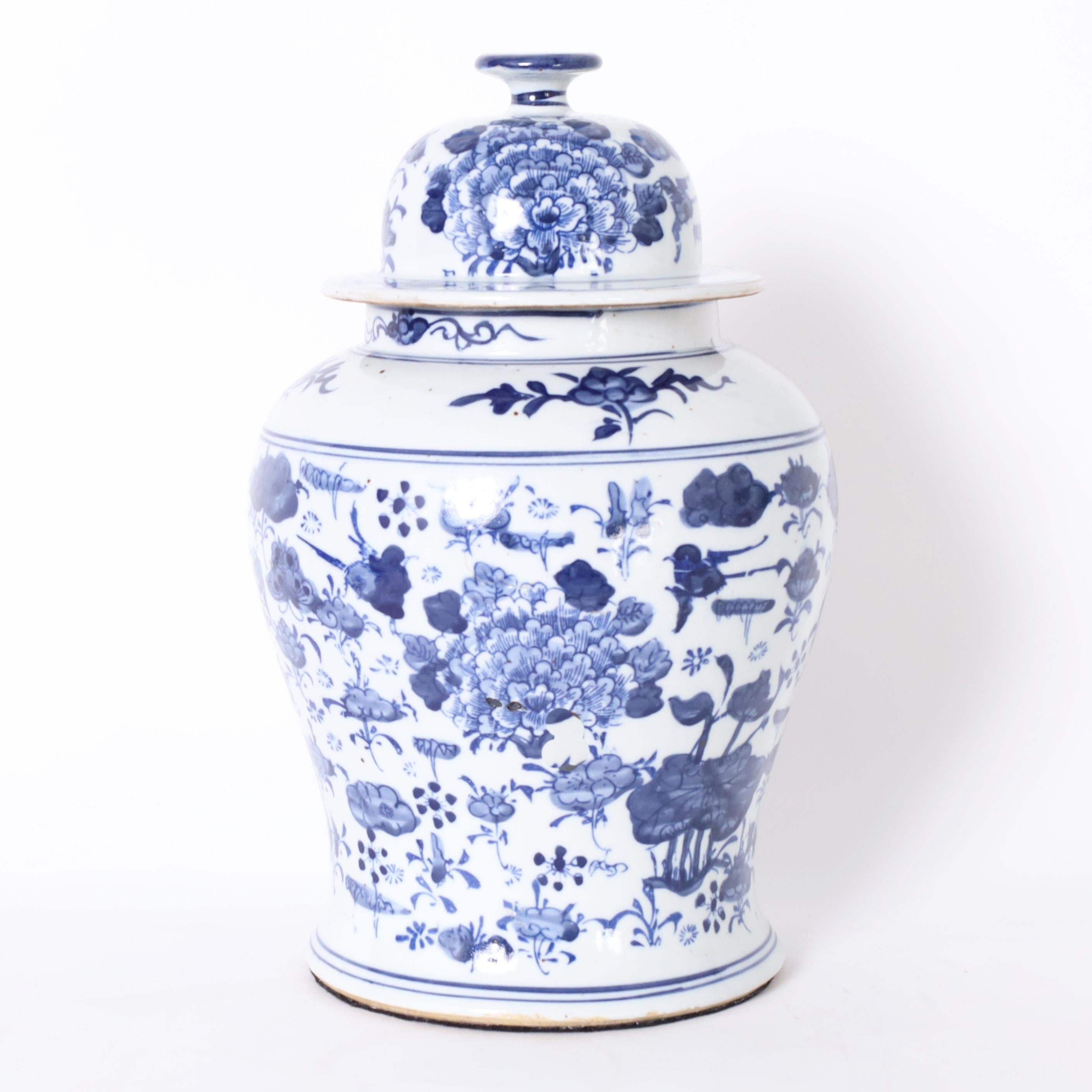 Chinese Pair of Blue and White Porcelain Ginger Jars with Birds and Flowers For Sale