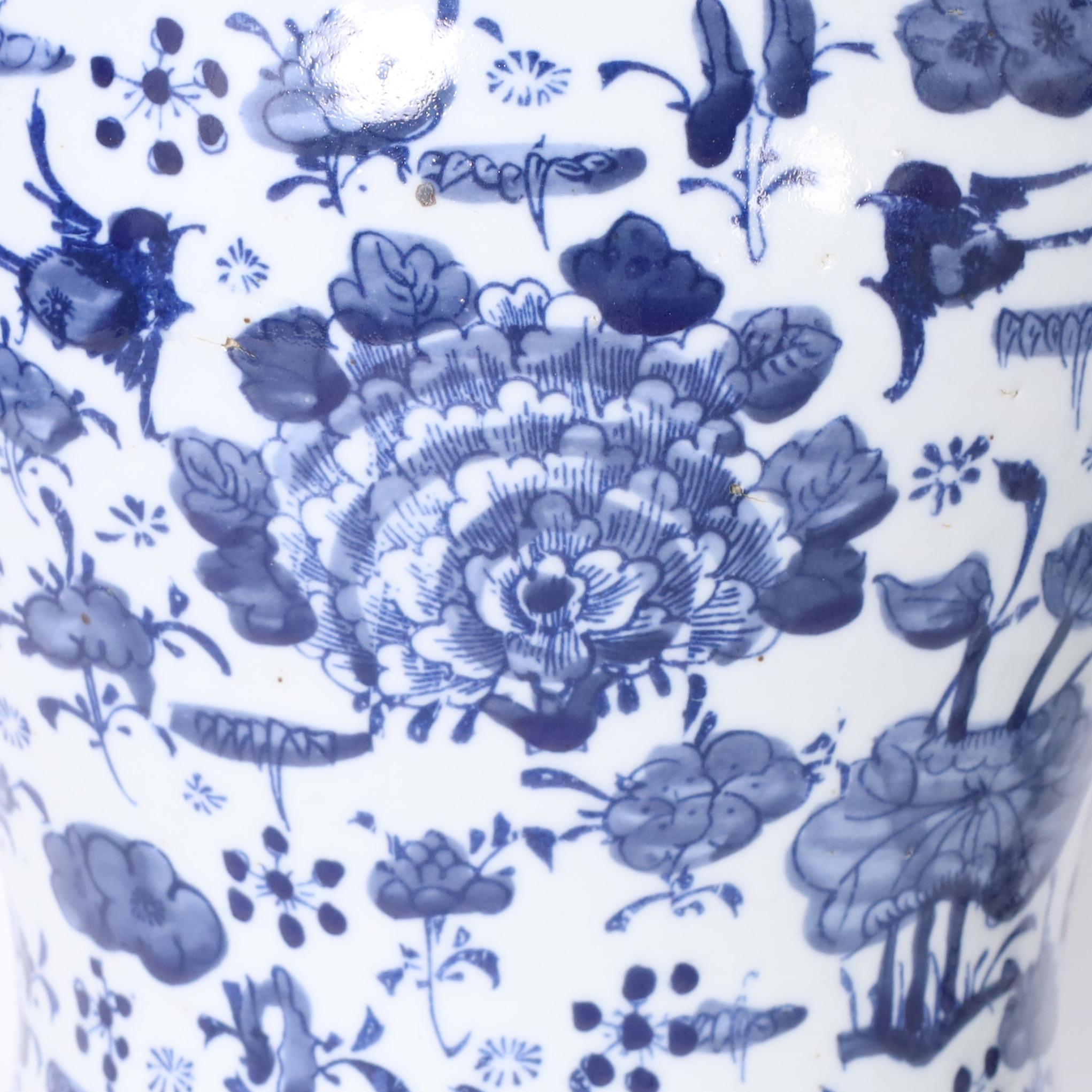 Pair of Blue and White Porcelain Ginger Jars with Birds and Flowers In Excellent Condition For Sale In Palm Beach, FL