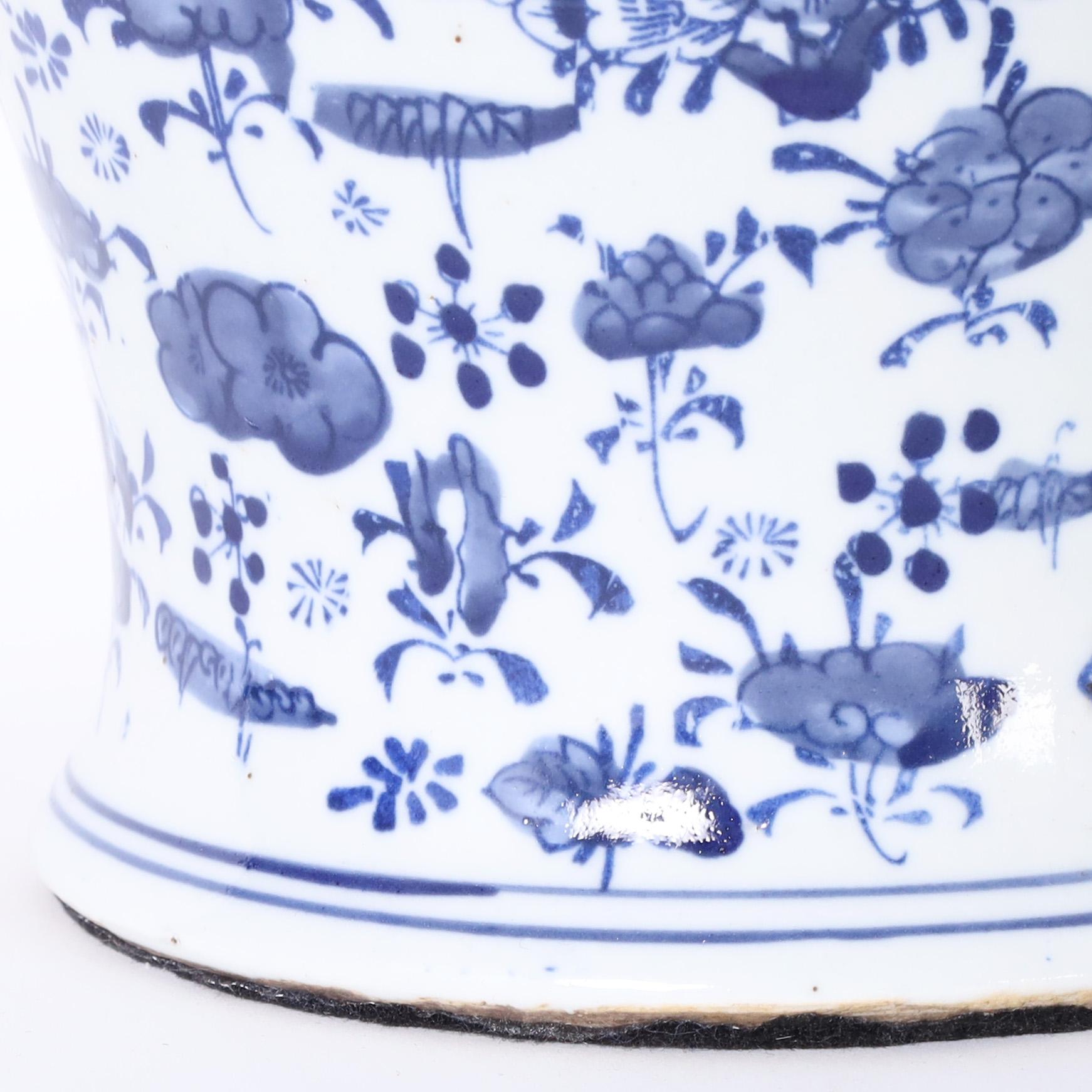 Contemporary Pair of Blue and White Porcelain Ginger Jars with Birds and Flowers For Sale