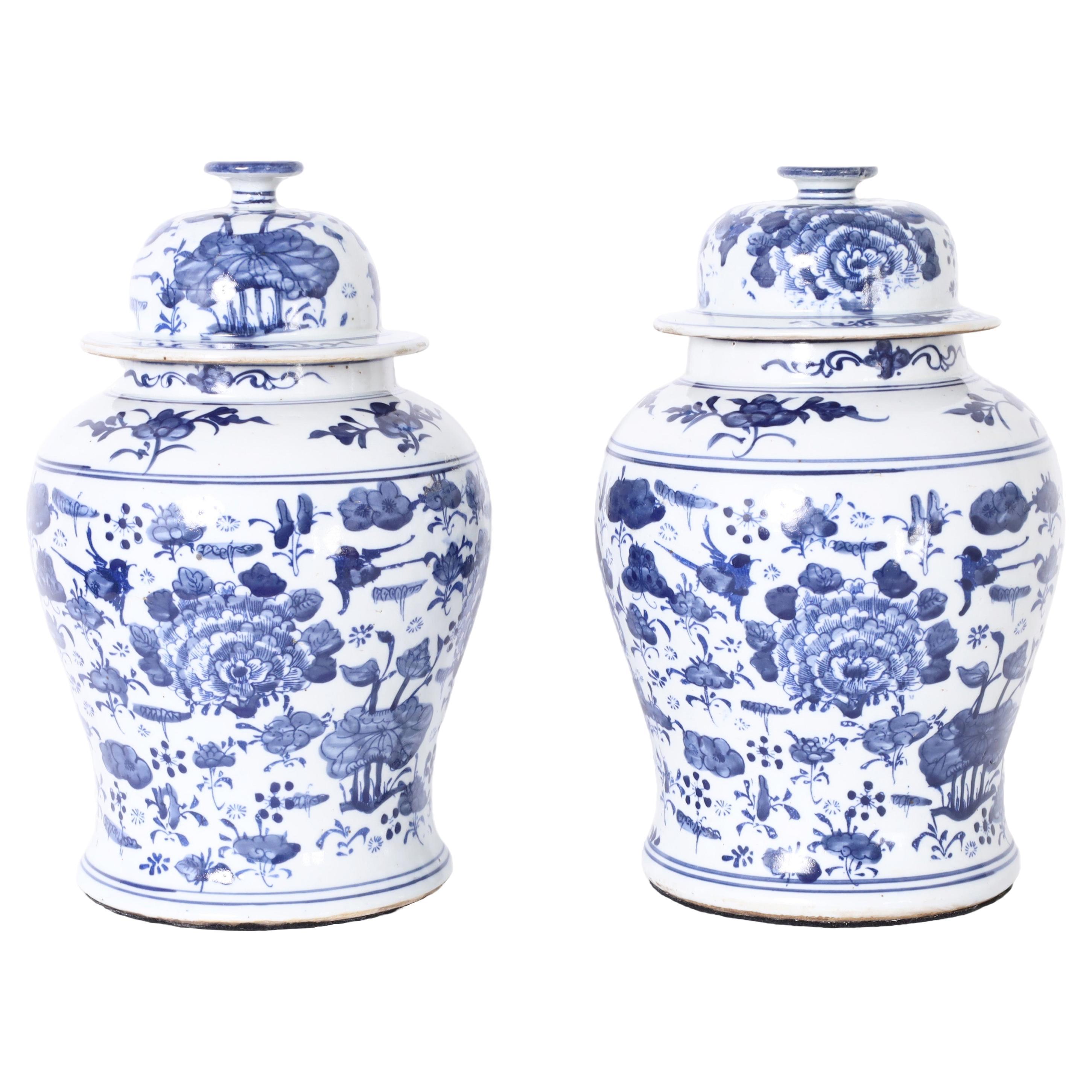 Pair of Blue and White Porcelain Ginger Jars with Birds and Flowers For Sale