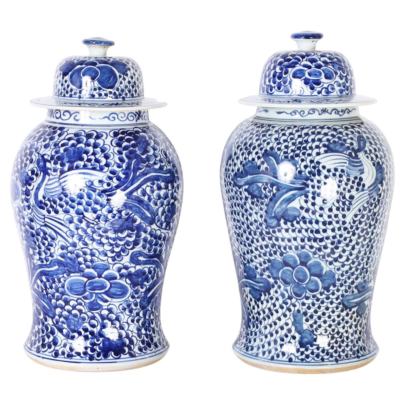 Pair of Blue and White Porcelain Lidded Ginger Jars with Birds & Flowers
