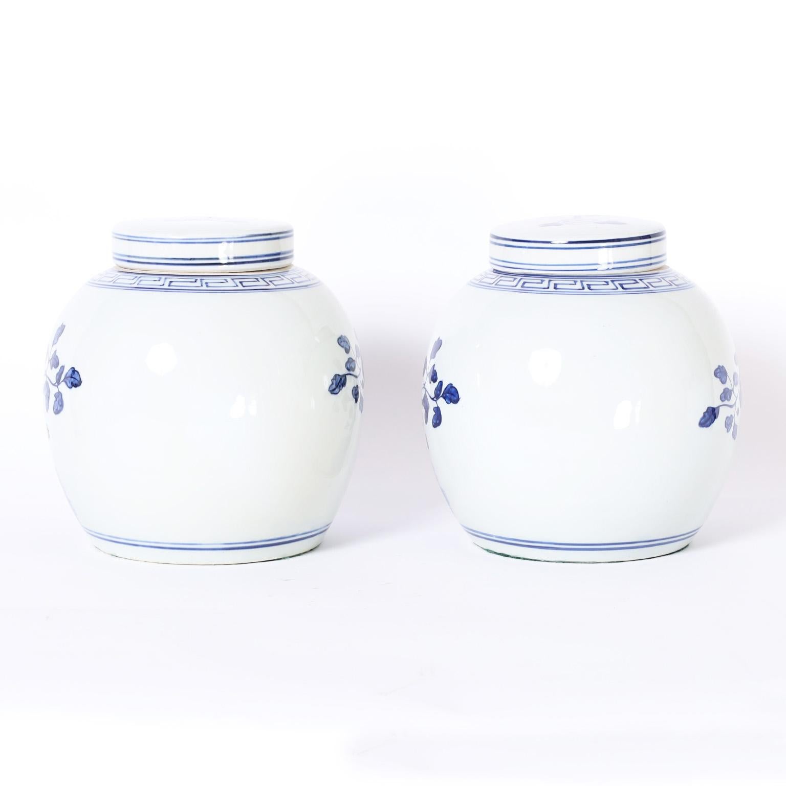 Chinese Export Pair of Blue and White Porcelain Lidded Jars with Flowers
