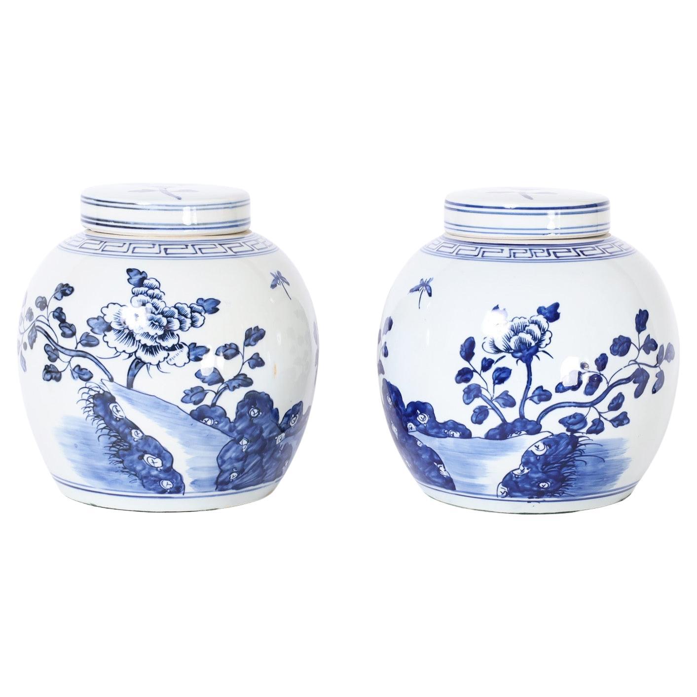 Pair of Blue and White Porcelain Lidded Jars with Flowers