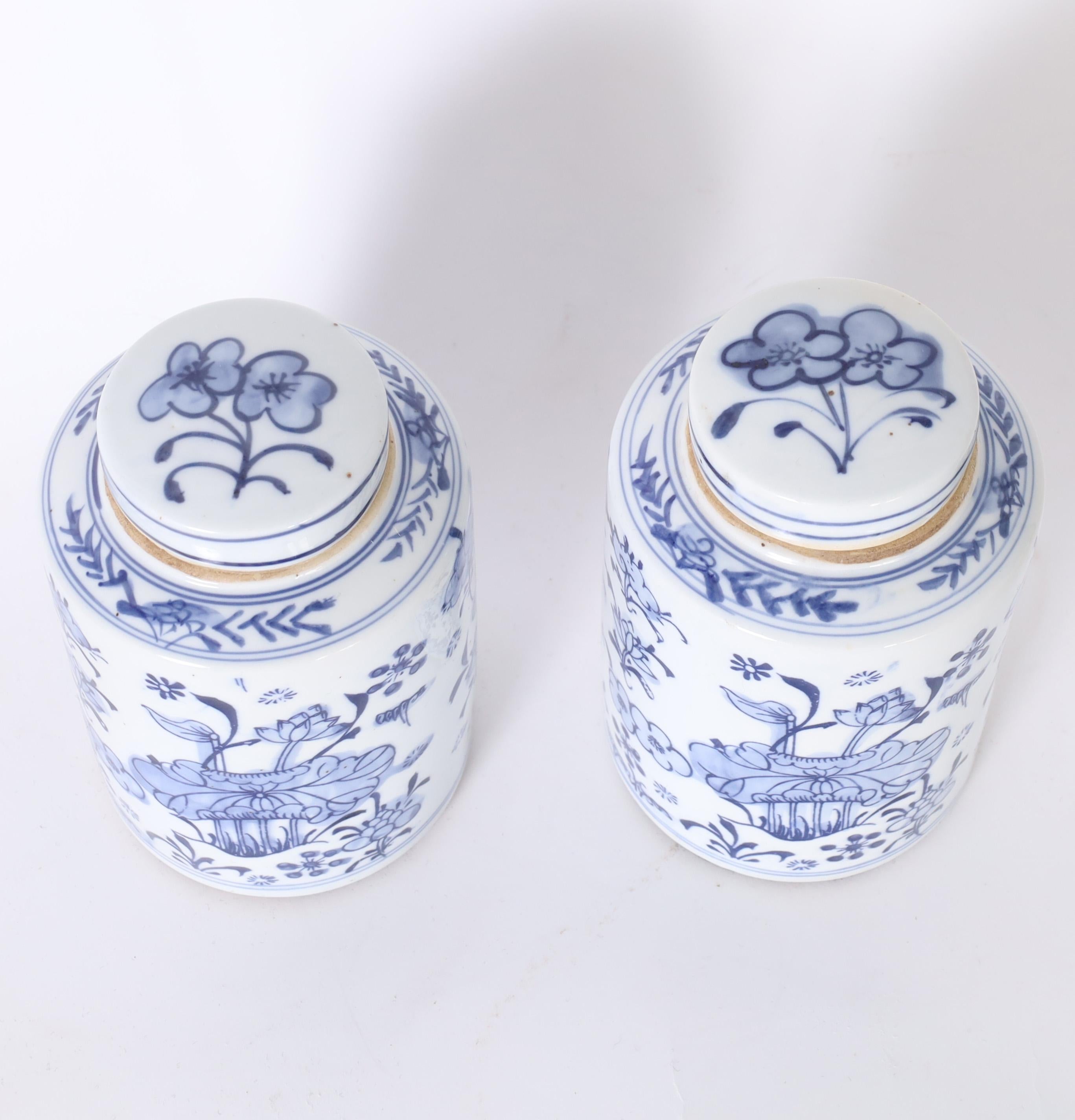 Chinese Export Pair of Blue and White Porcelain Lotus Ginger Jars For Sale
