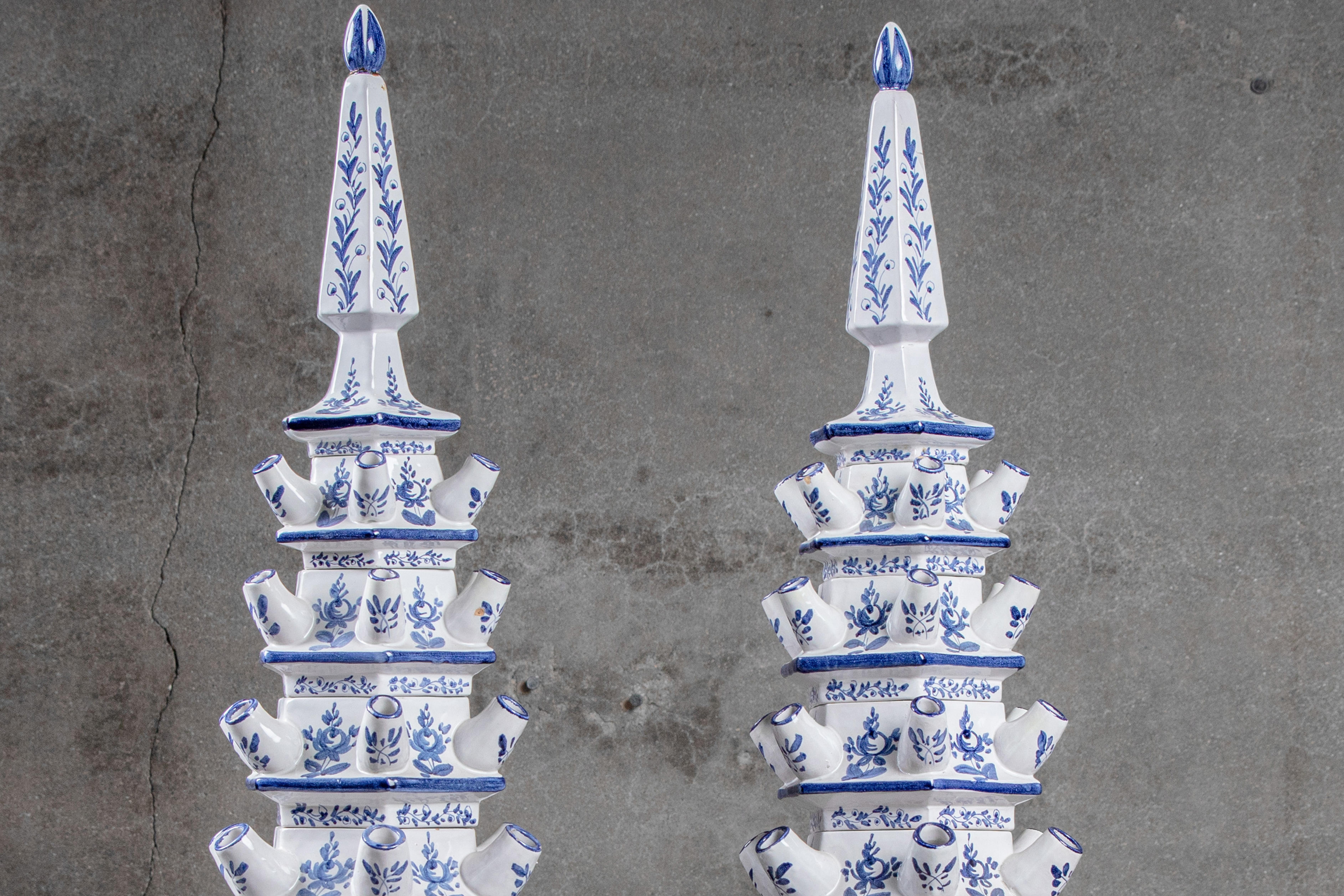 Pair of Dutch blue and white porcelain tulipieres in 4 pieces. The tulipieres each come in four pieces which is ideal as it allows for easy access when you need to add water and when you want to move or carry them somewhere; they will never get too