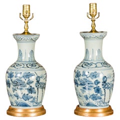 Pair of Blue-and-White Porcelain Vases Made into Table Lamps on Giltwood Bases