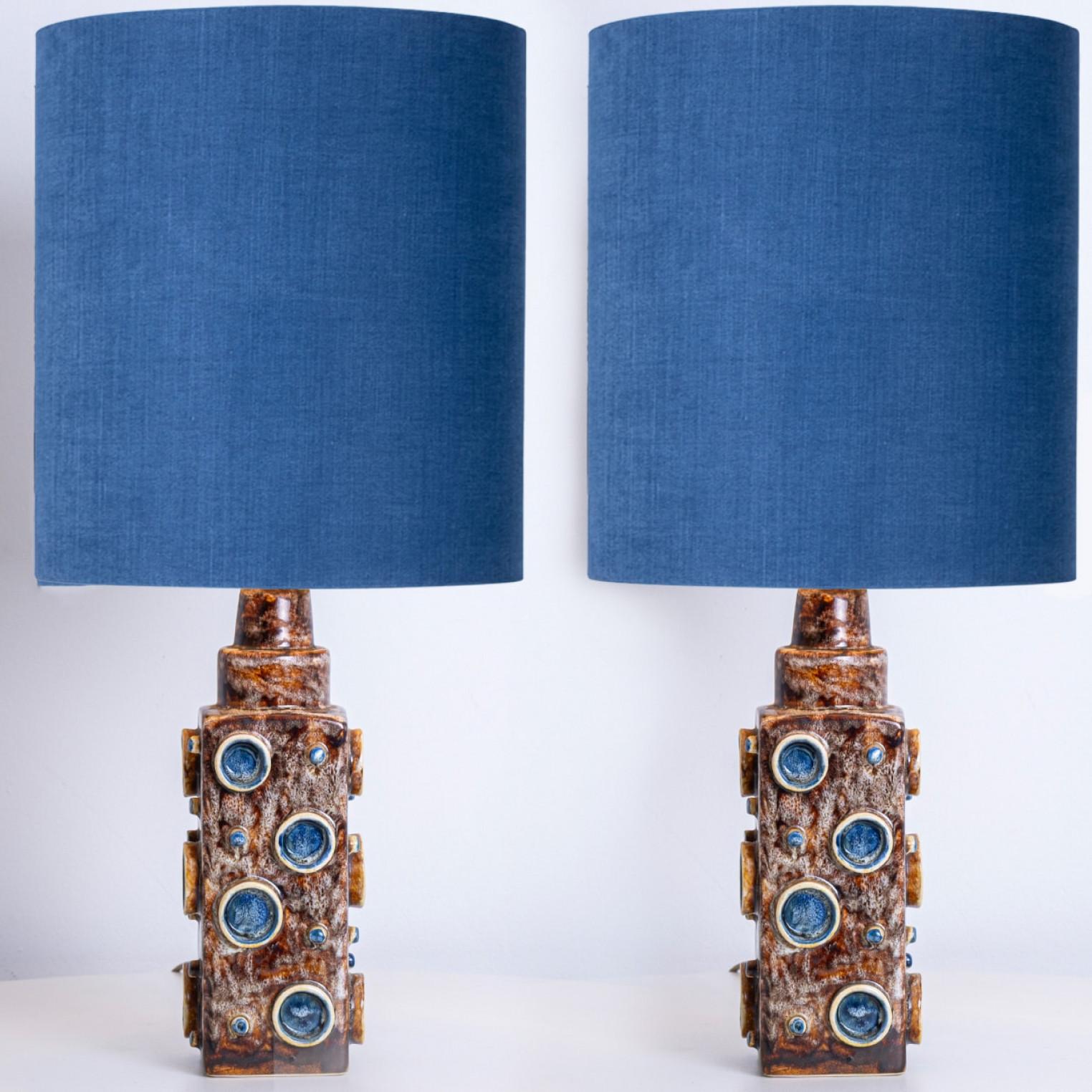 Ceramic table lamps by Soholm, Denmark, 1960s. This high-end sculptural piece is handmade ceramic in brown and blue tones. With a new custom made blue silk lamp shade with warm bronze inner-shade by René Houben.

The lamp is in perfect vintage