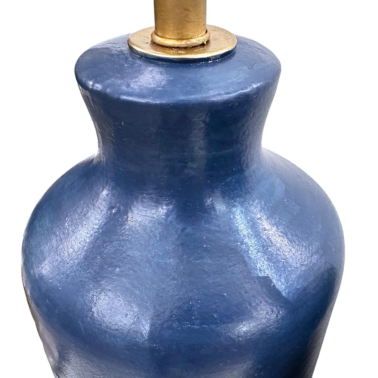 Pair of Italian circa 1960's blue ceramic table lamps.

Measurements:
Height of body: 17