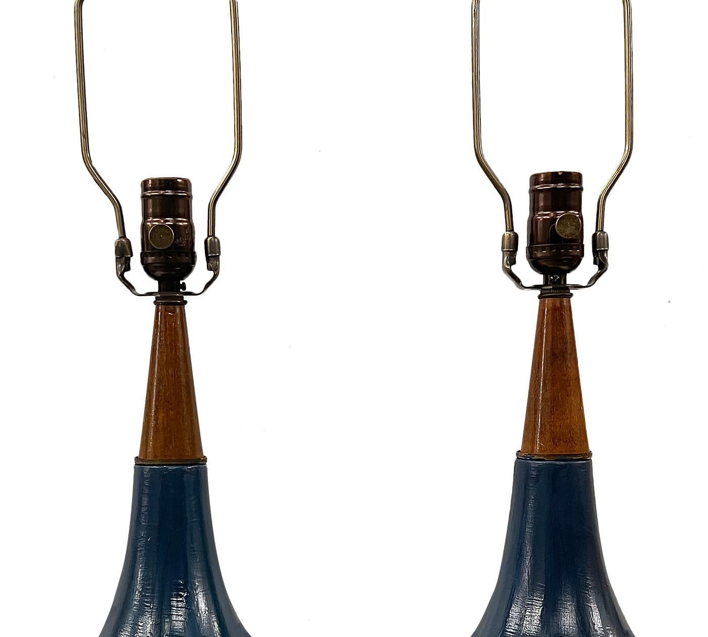 Pair of circa 1960's Italian ceramic lamps.

Measurements:
Height of body: 17