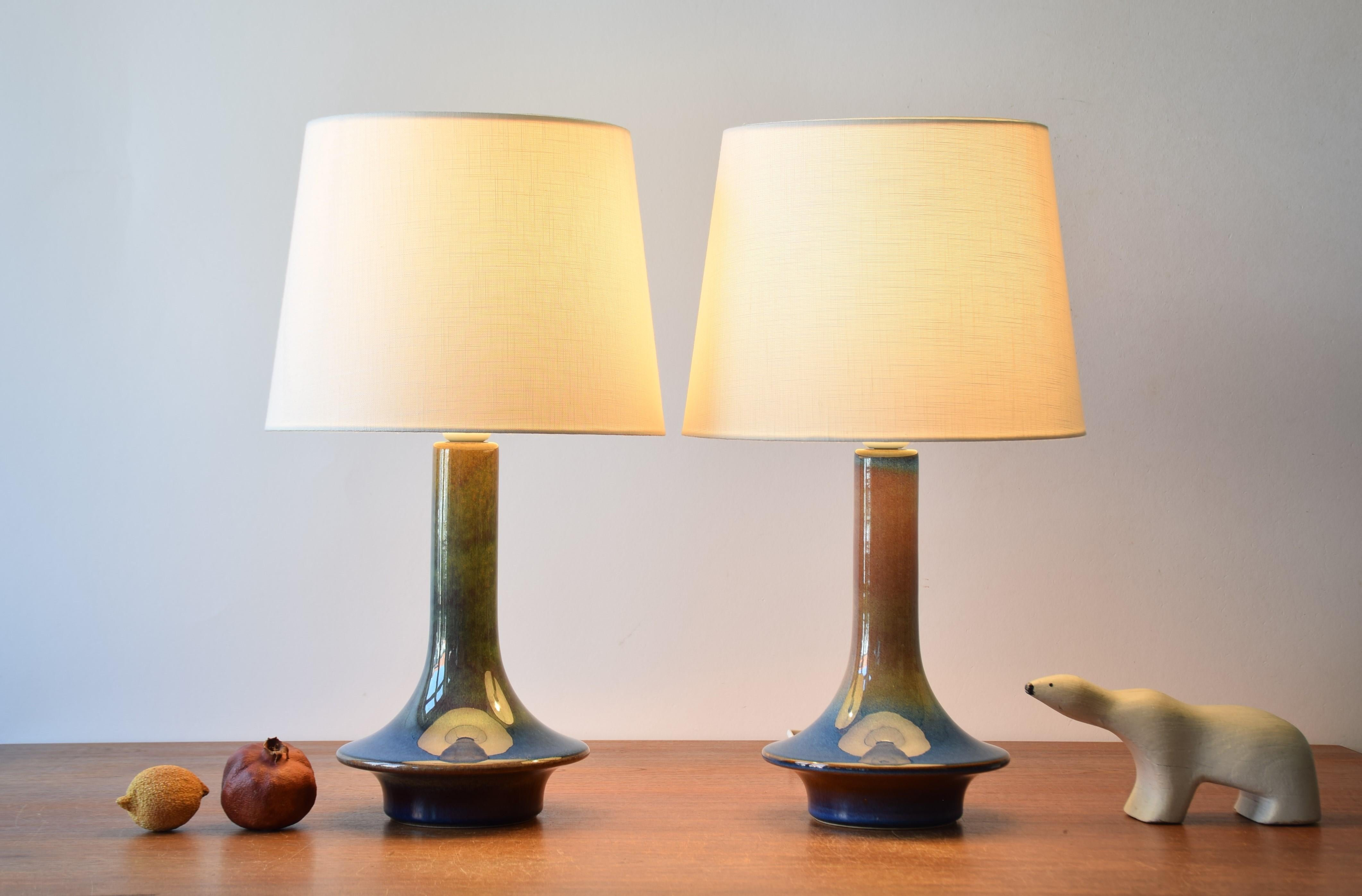 Rare pair of sculptural table lamps from Søholm Stentøj, Denmark, circa 1960s.
The lamps have glaze with a beautiful color play in blue, purple and brown.

Included are a new lamp shades designed and made in Denmark. They are made of woven fabric