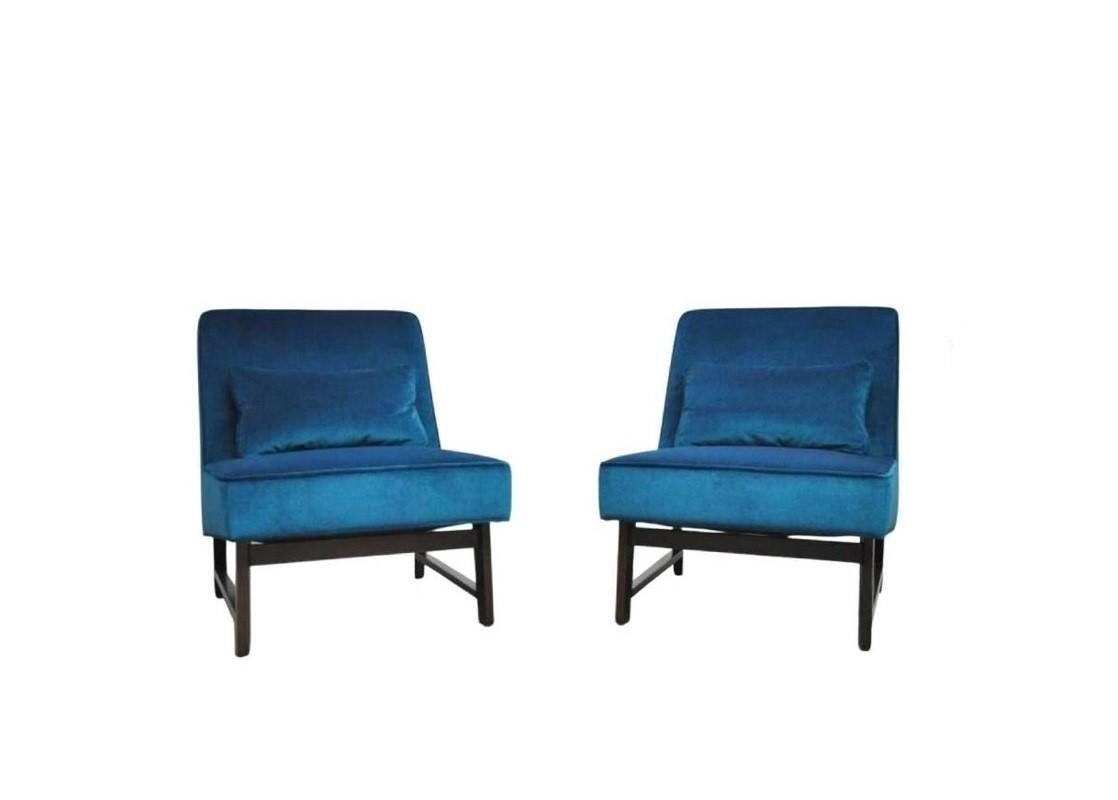 1950's Classic American mid-century Edward Wormley for Dunbar slipper chairs model #127. With its timeless yet fashion-forward appeal these chairs are one of the most recognized designs done by Wormley. These low-profile chairs featuring a