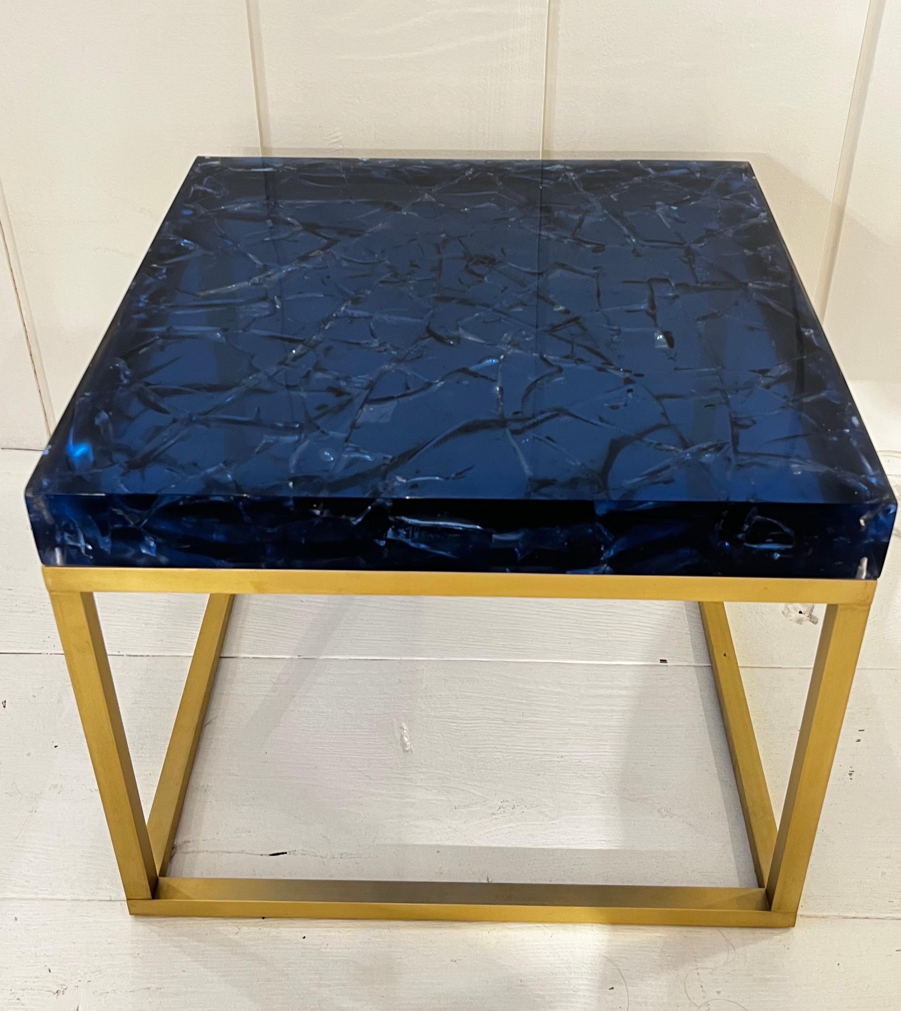 Pair of blue color fractal resin tables
mounted on brass feet
Perfect condition
