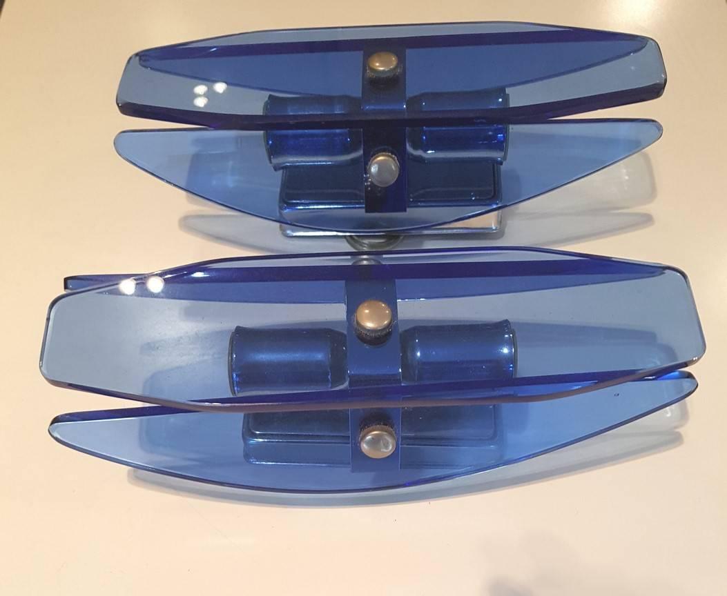 Pair of blue glass and chrome wall lights by Veca.
