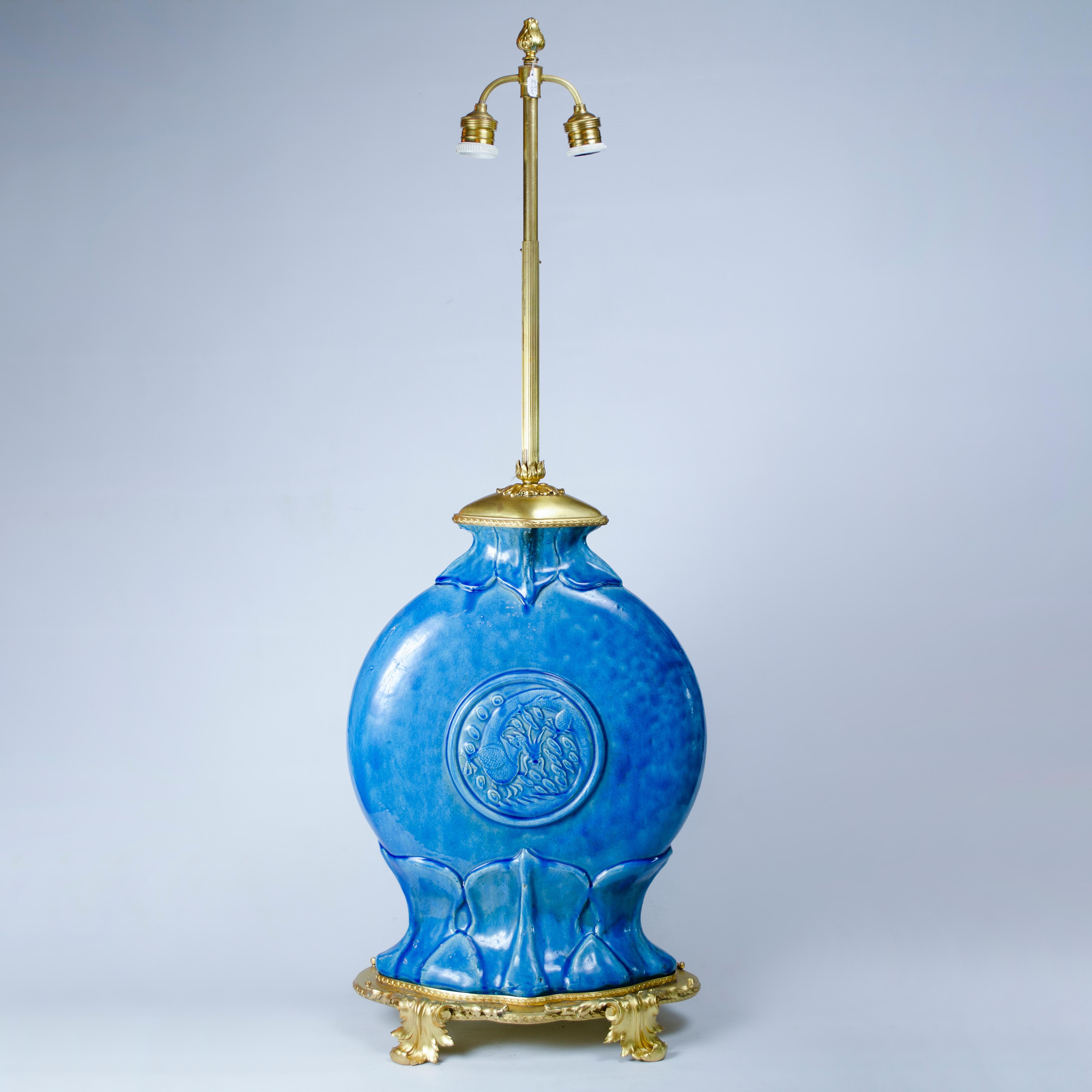 Pair of Blue Glaze ceramic table lamps, with bronze base and stem, made by Theodore Deck (1823-1891). Signed HT DECK, MADE IN FRANCE, France,

France, CIRCA 1880.
