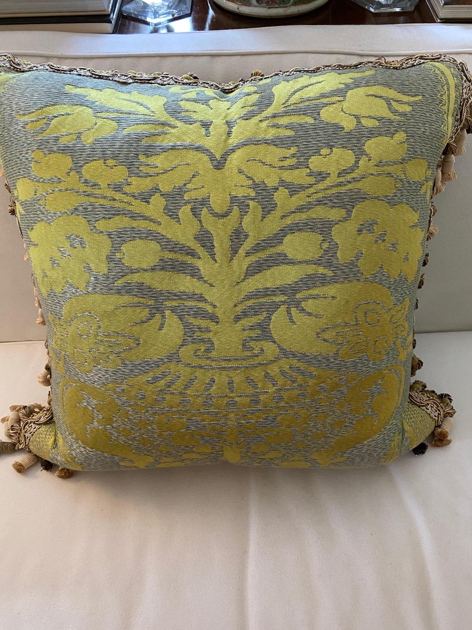 Decorative pair of blue/green silk cushions with bell-shaped fringe and blue silk backside.
Measures: 23