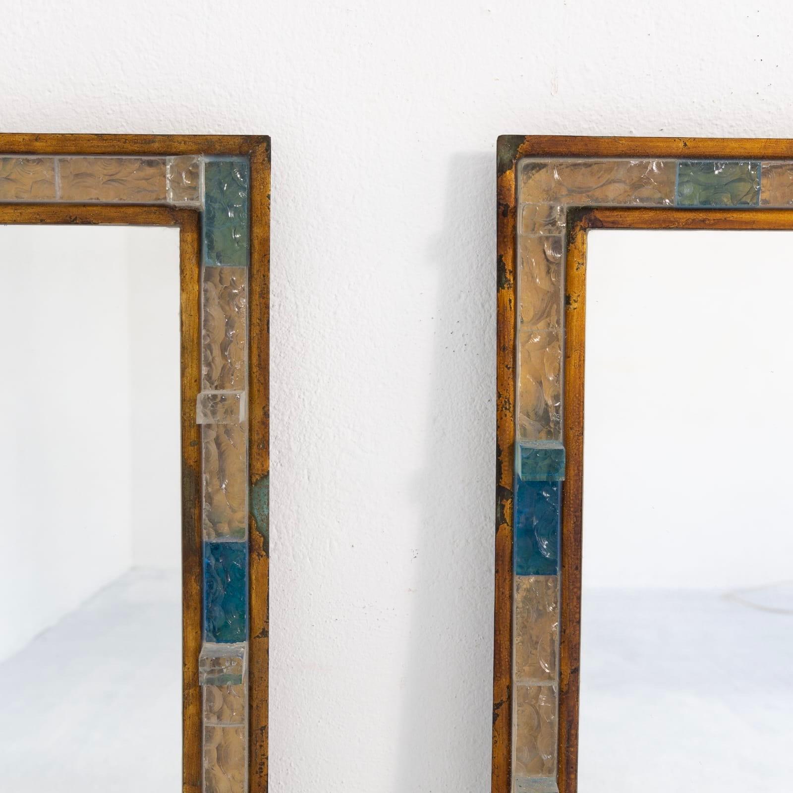 Very rare pair set of 2 large wall mirrors blue and clear hammered glass, gilt gold leaf wrought iron by the manufacture Poliarte in Verona in a Brutalist style, the most famous manufacture of Verona concurrent of Longobard and Biancardi during the