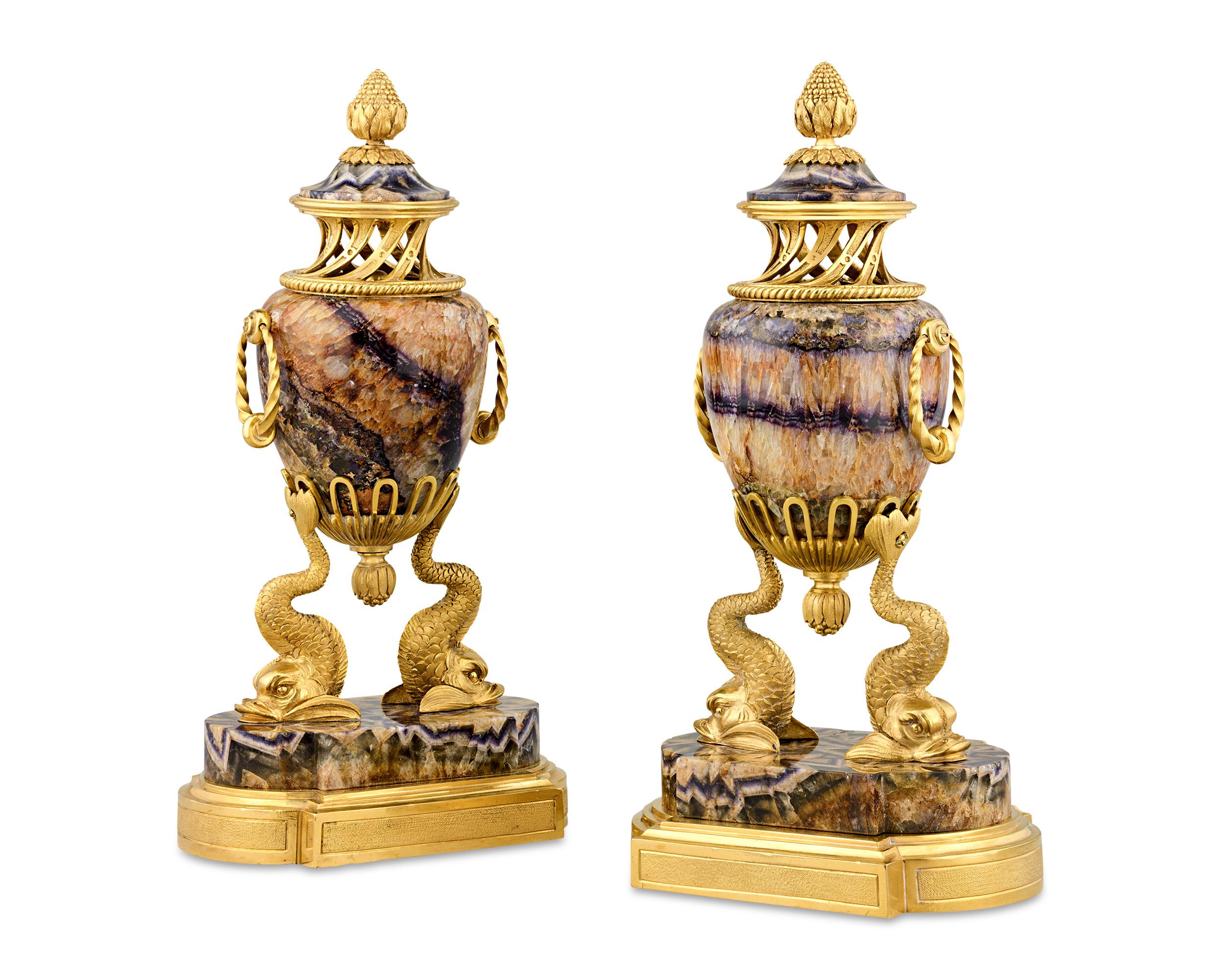Blending natural wonder and artistic prowess, this magnificent pair of cassolettes is a symphony of craftsmanship. The intricate gilt bronze decor, only made possible by the finest craftsmen of the 19th century, is further elevated by the bodies,