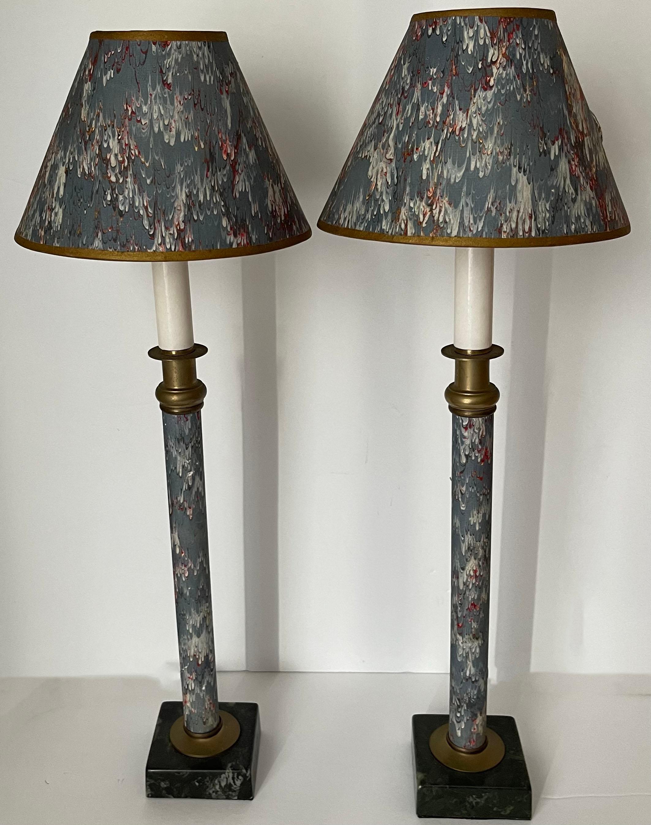 Pair of blue marbleized paper candlestick lamps. Black square marble base. As found, original matching paper clip on lampshades are included. Newly rewired with clear cords and side on/off switches.
Each lamp takes one chandelier bulb max 60 watts