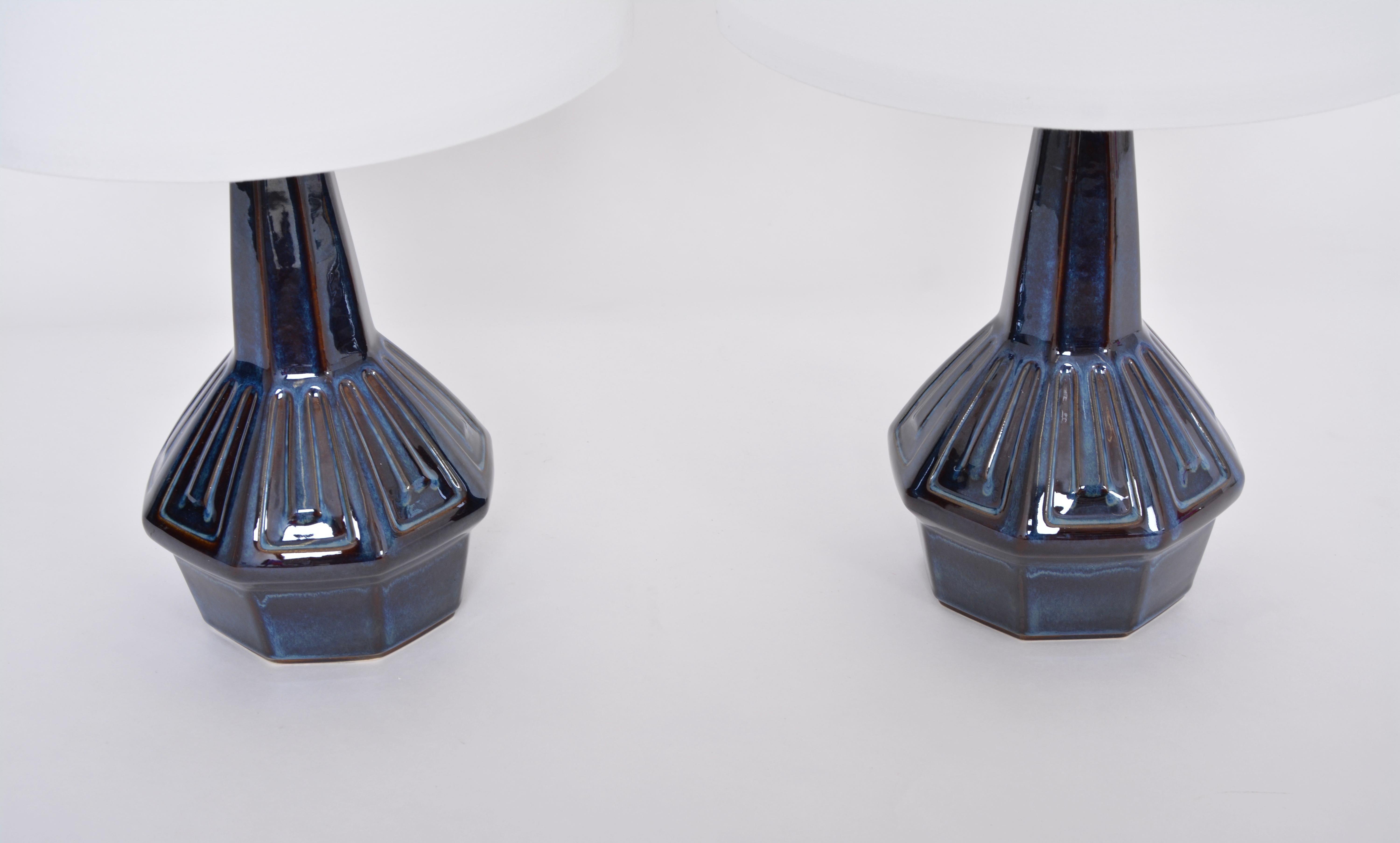 Pair of Blue midcentury Table Lamps Model 1055 by Einar Johansen for Soholm

Pair of ceramic table lamps designed by Einar Johansen and produced by Danish company Soholm Stentoj probably in the 1960s. The lamp's base are made of stoneware and are