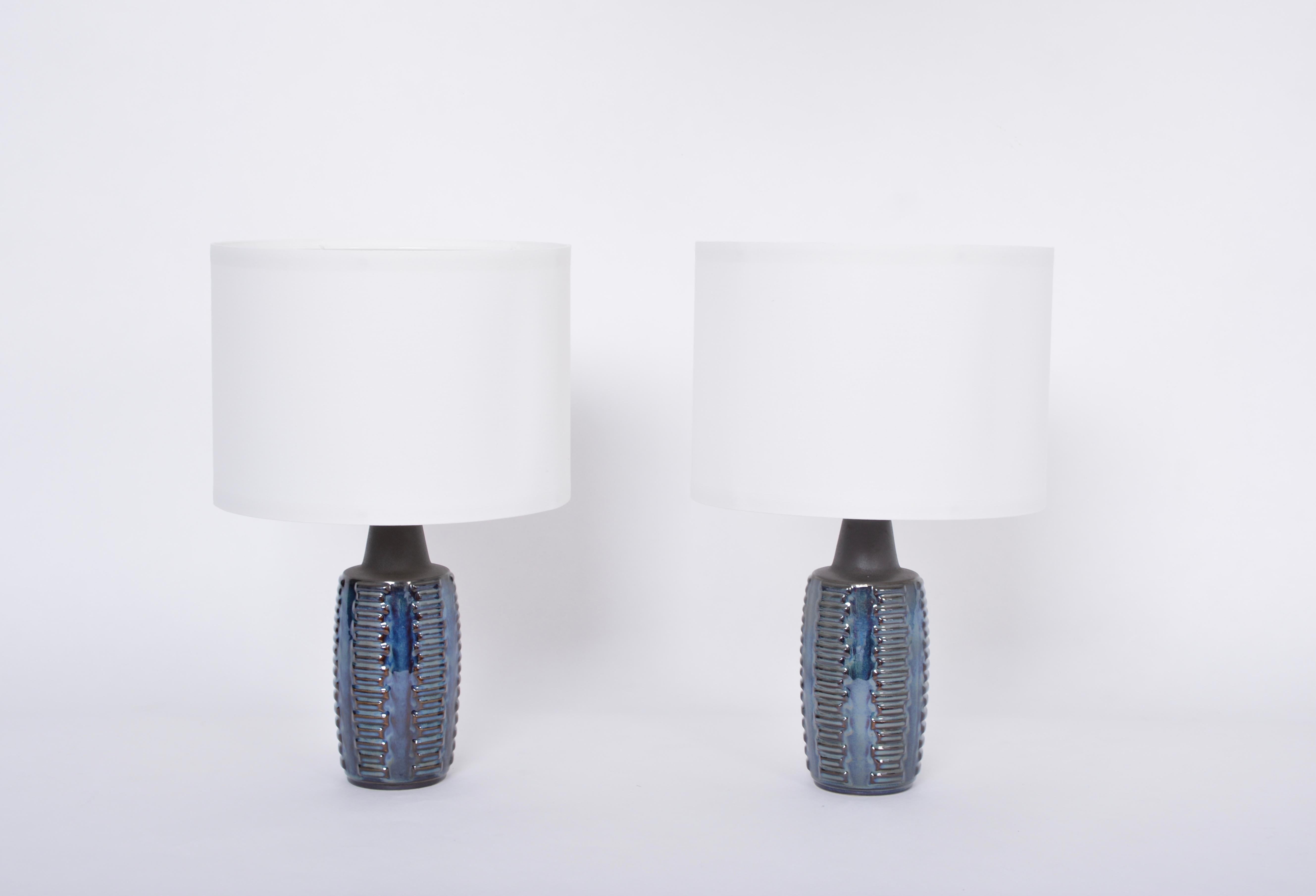 Pair of Blue Midcentury Table Lamps Model 1034 by Einar Johansen for Soholm

Pair of ceramic table lamps designed by Einar Johansen and produced by Danish company Soholm Stentoj probably in the 1960s. The lamp's base are made of stoneware and are