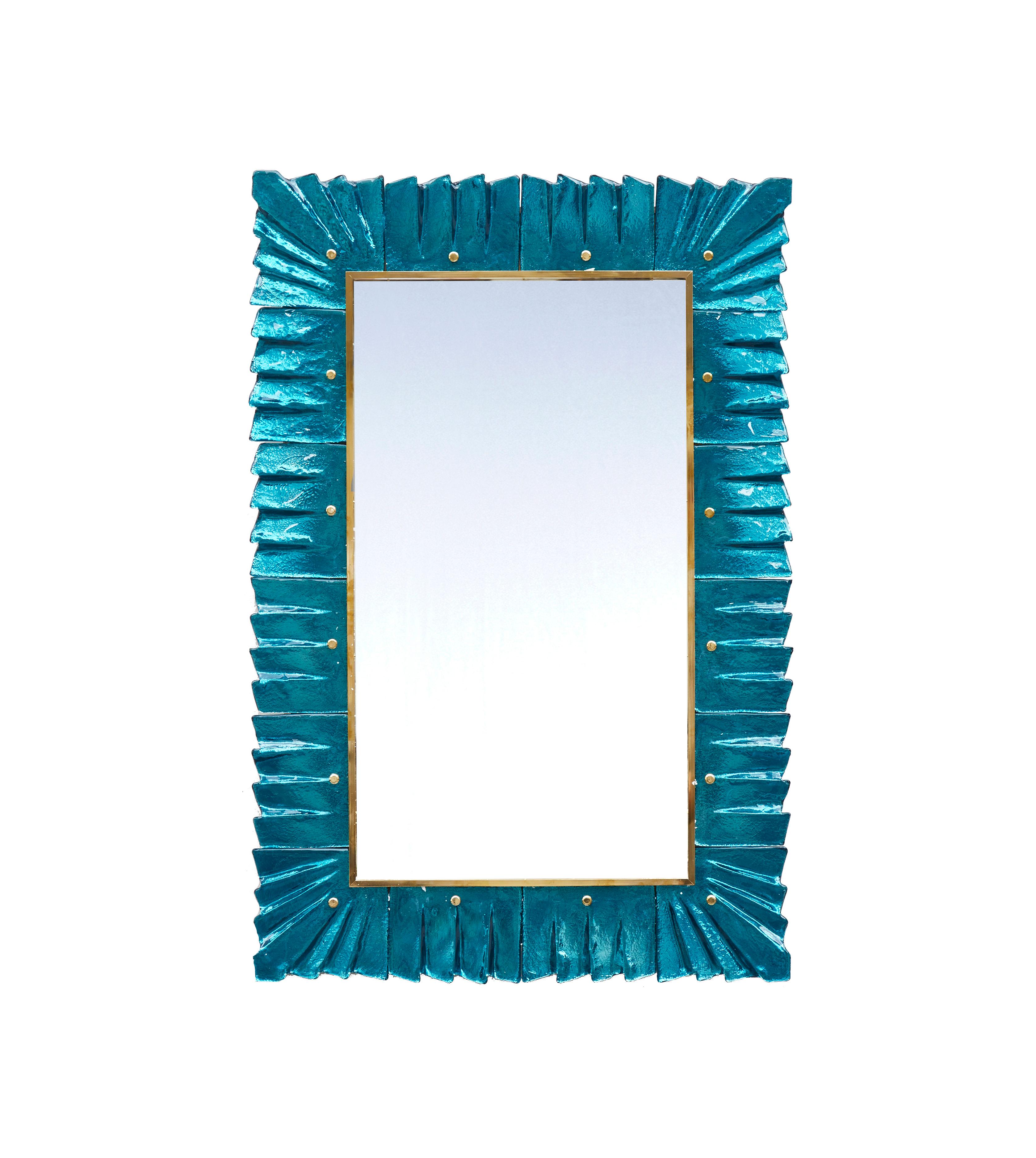 Pair of beautiful mirrors with frame made of sculpted blue Murano glass. Creation by Studio Glustin.
Price for the pair.