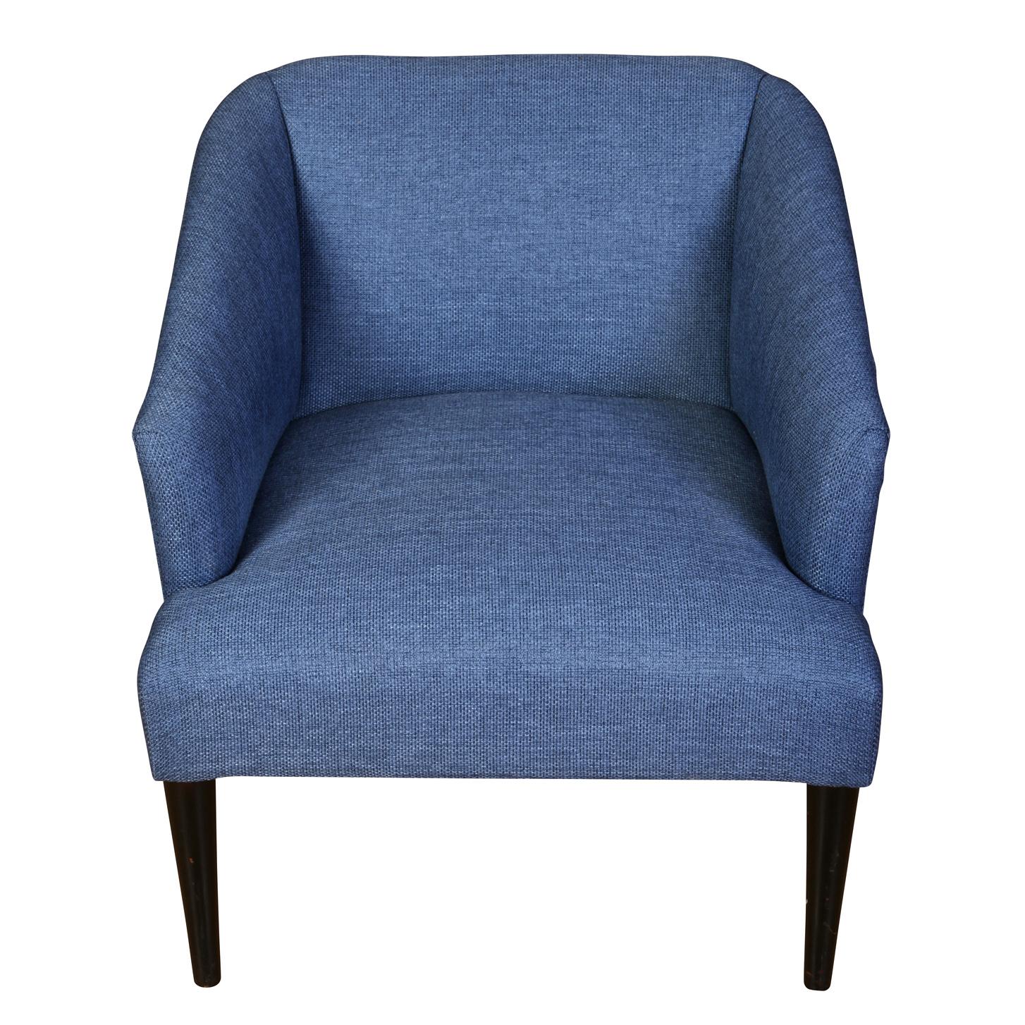 A vintage pair of modern blue upholstered lounge chairs with narrow dark wood legs.