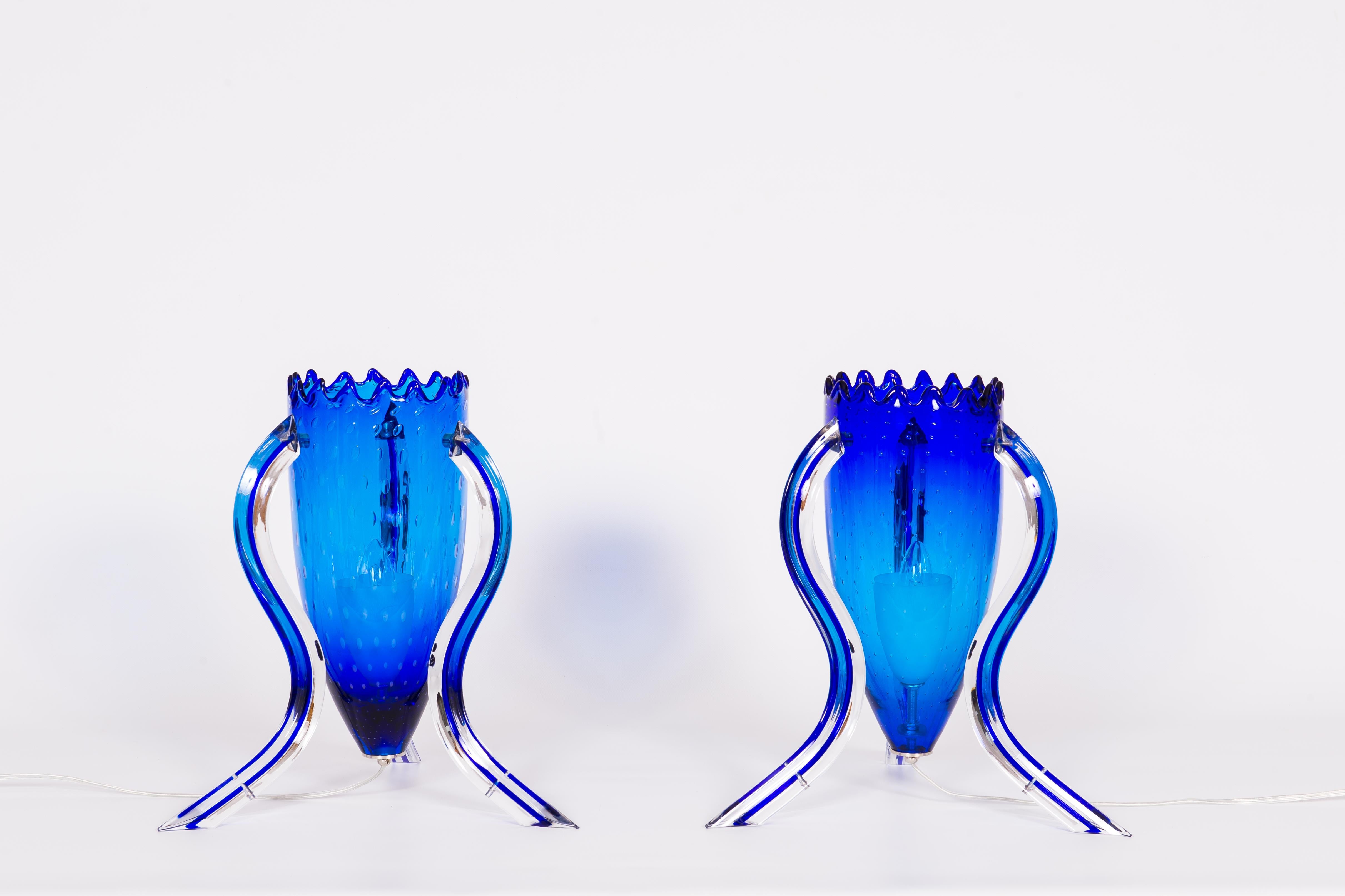 Pair of Blue Murano Glass Table Lamps with Morise Decorations, Italy, 1990s. Limited Edition.
This amazing pair of table lamps has a unique and refined design, by Vintage Murano Gallery. The lamps are made of a main cone-shaped vase, with many