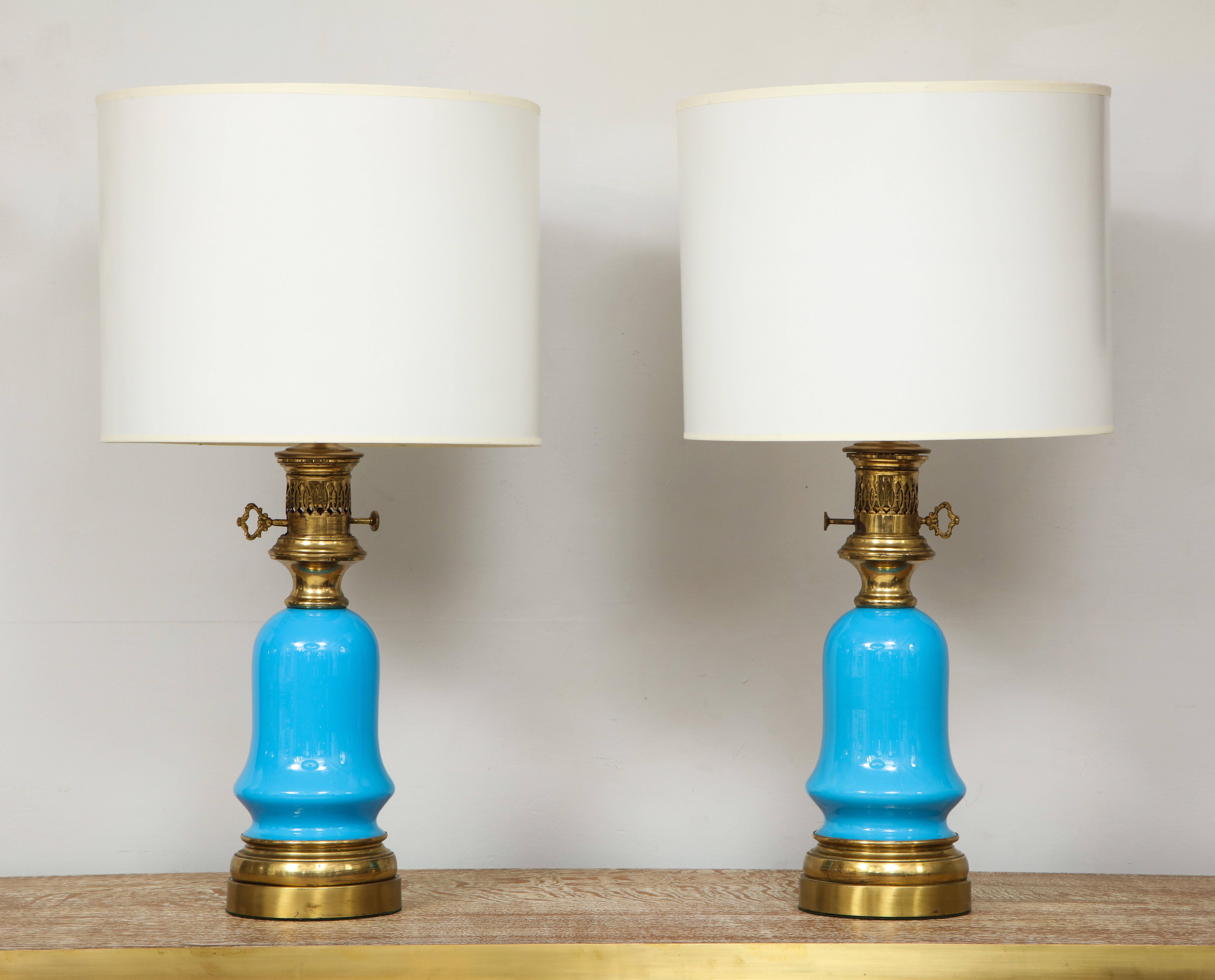 Pair of blue opaline glass lamps. The shades are not included.