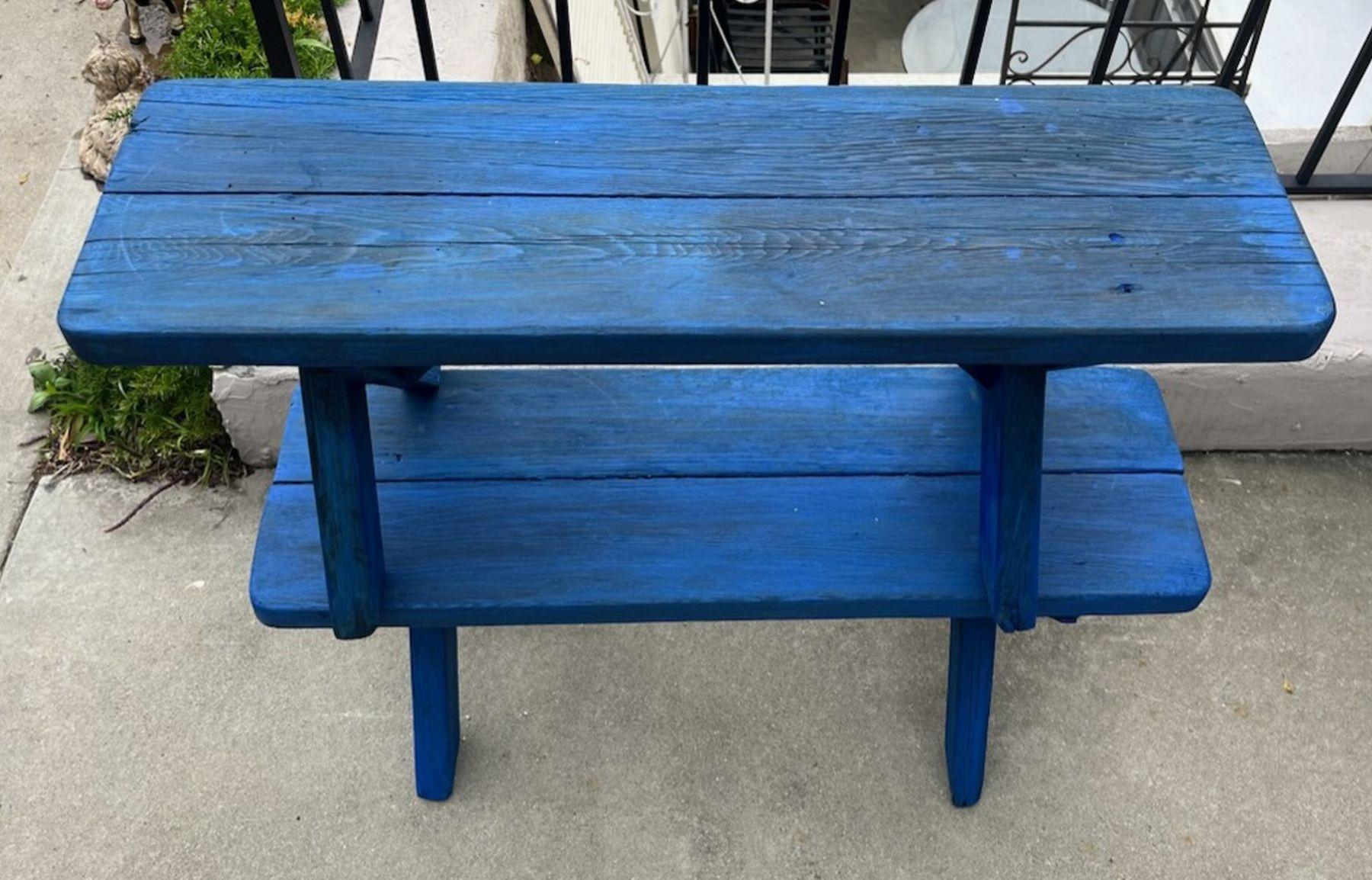 20Thc Blue painted park benches or picnic benches in fantastic sturdy condition.These benches are blue over red painted surface.Both are in  very good condition. The pair were found in the mid west.Sold as a pair.