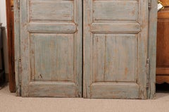 Pair of Blue Painted Wooden Doors, from France ca. 1890