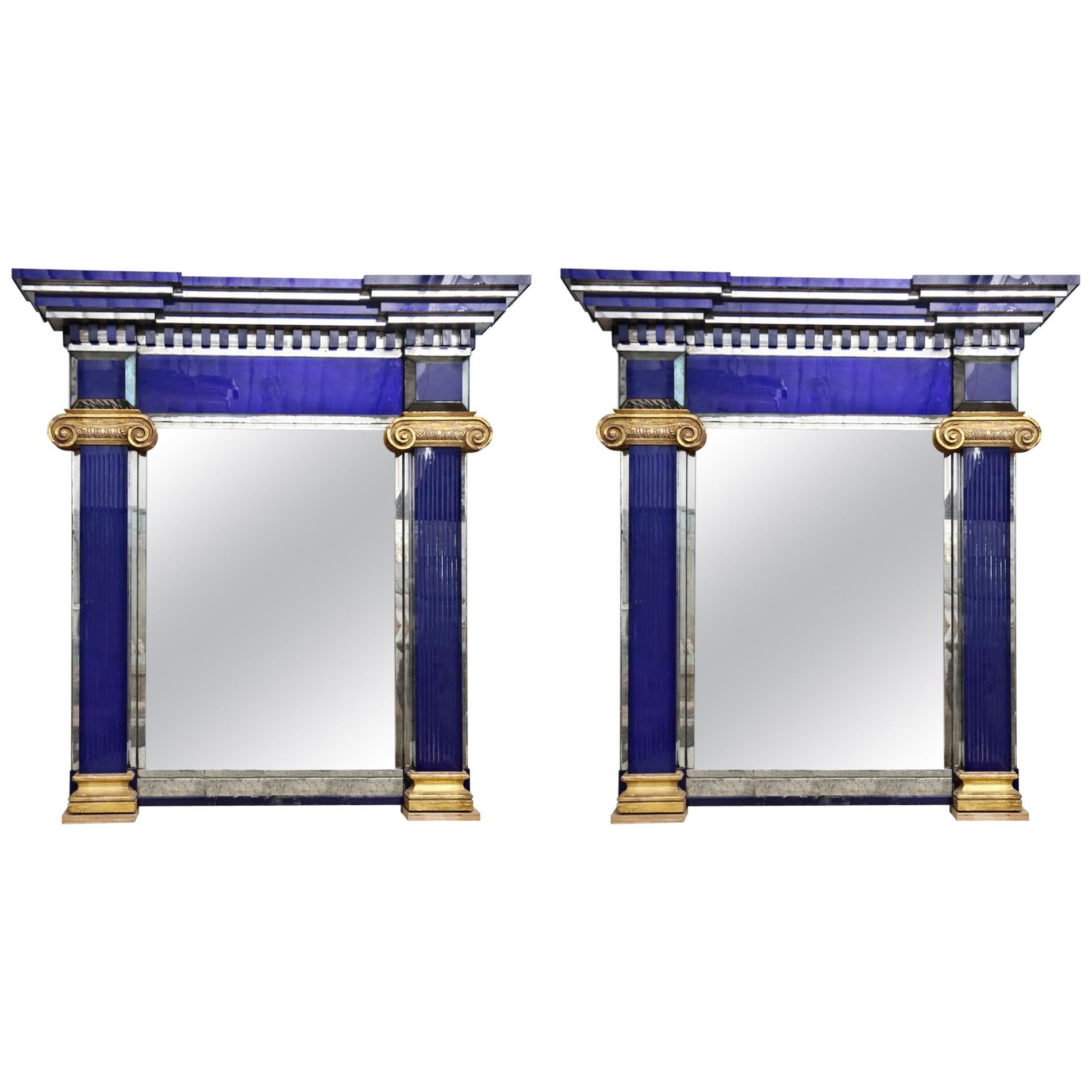 Pair of Blue Paneled Mirrors with Giltwood Details